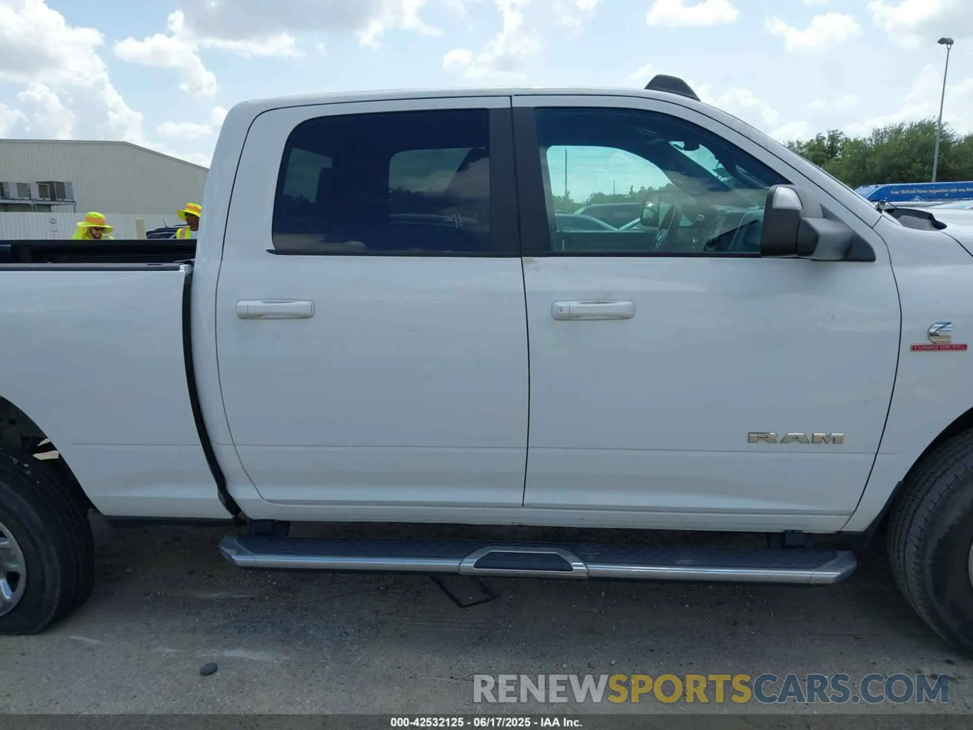 14 Photograph of a damaged car 3C6UR5DL4MG555180 RAM 2500 2021