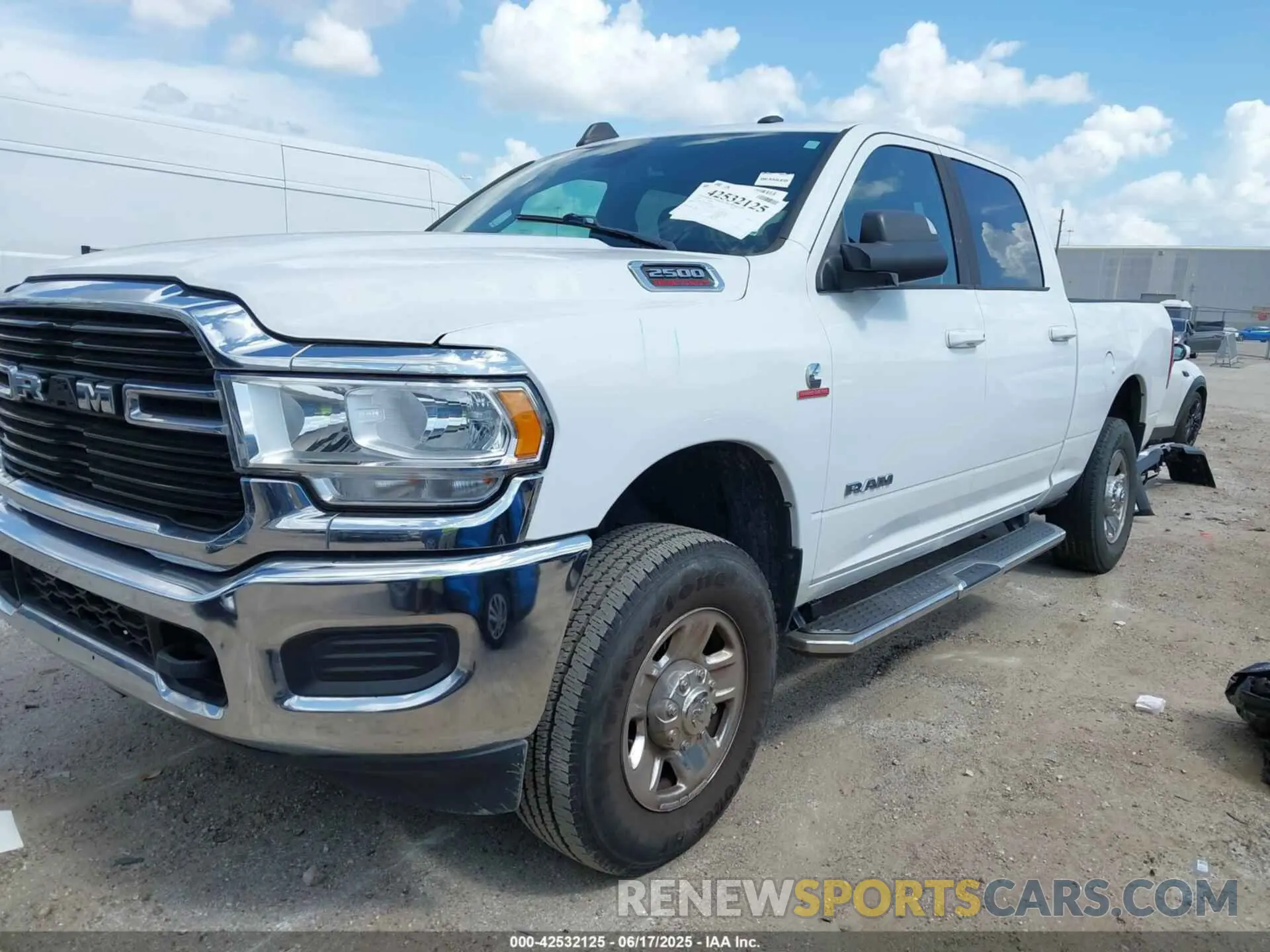 2 Photograph of a damaged car 3C6UR5DL4MG555180 RAM 2500 2021
