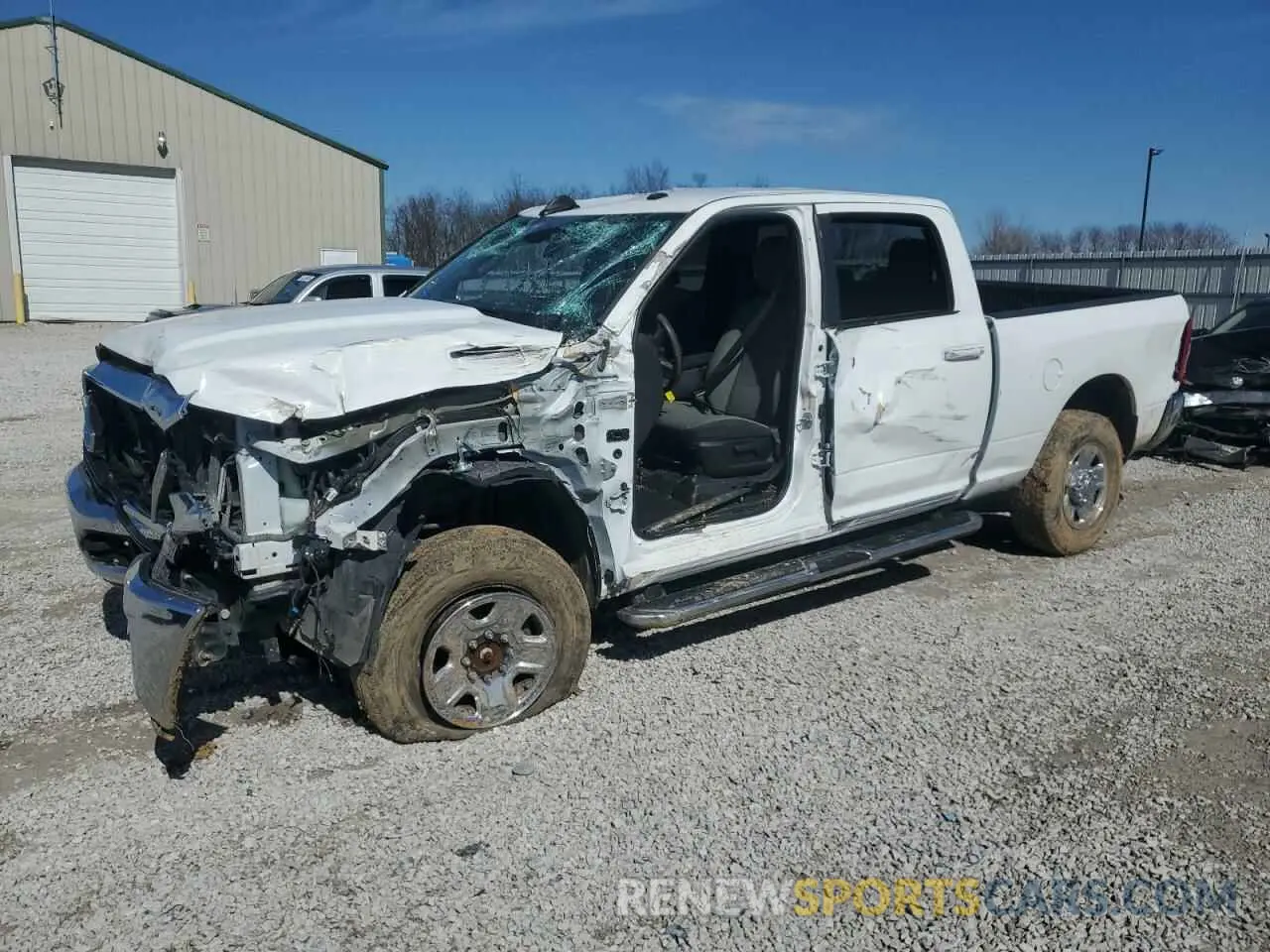 1 Photograph of a damaged car 3C6UR5DL6MG509091 RAM 2500 2021