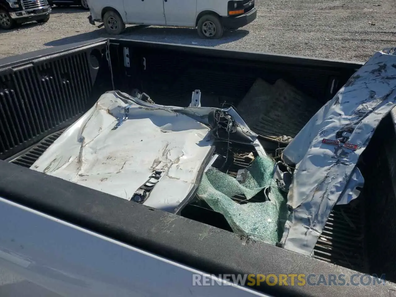 12 Photograph of a damaged car 3C6UR5DL6MG509091 RAM 2500 2021