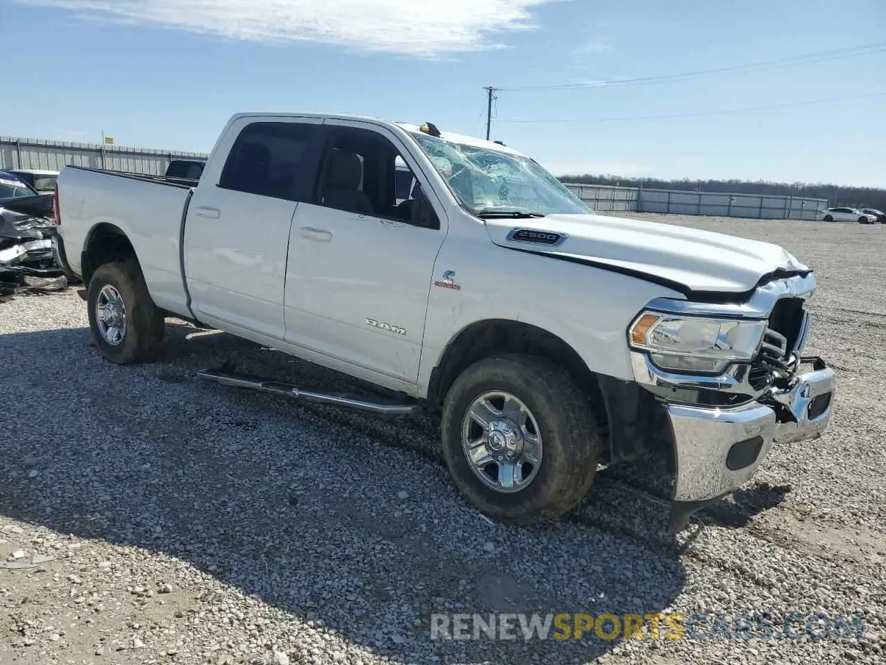 4 Photograph of a damaged car 3C6UR5DL6MG509091 RAM 2500 2021