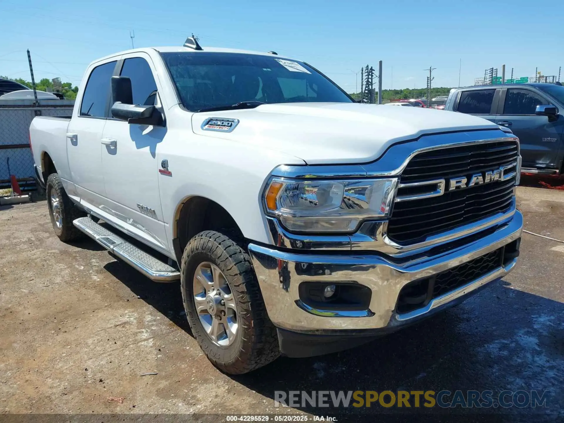 1 Photograph of a damaged car 3C6UR5DL6MG512539 RAM 2500 2021