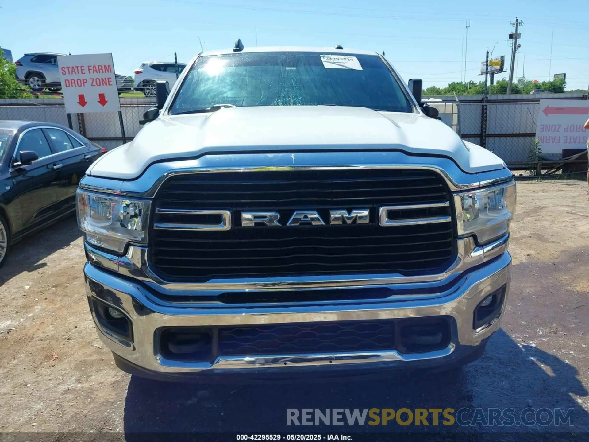 12 Photograph of a damaged car 3C6UR5DL6MG512539 RAM 2500 2021