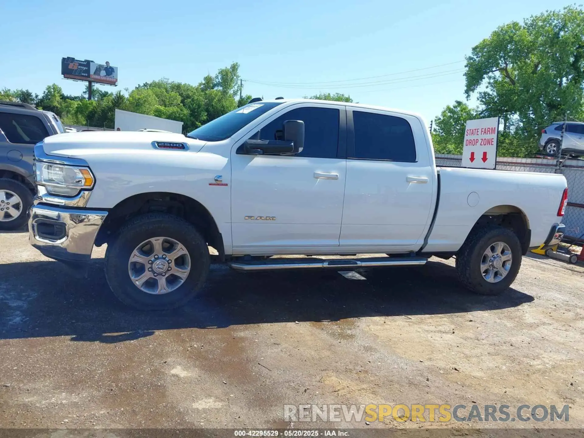 14 Photograph of a damaged car 3C6UR5DL6MG512539 RAM 2500 2021