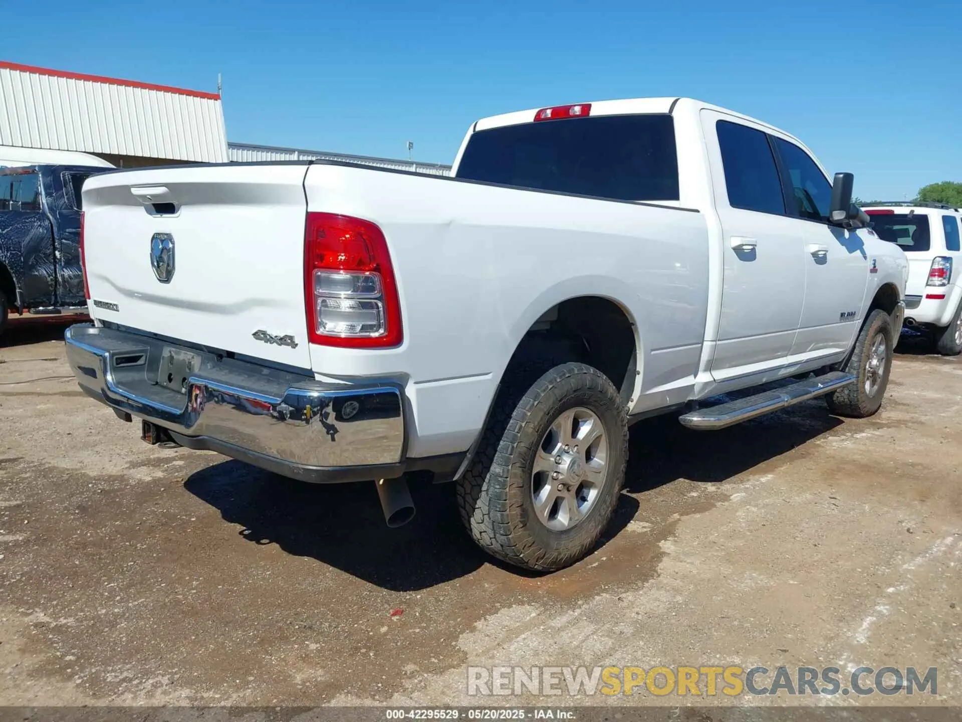 4 Photograph of a damaged car 3C6UR5DL6MG512539 RAM 2500 2021