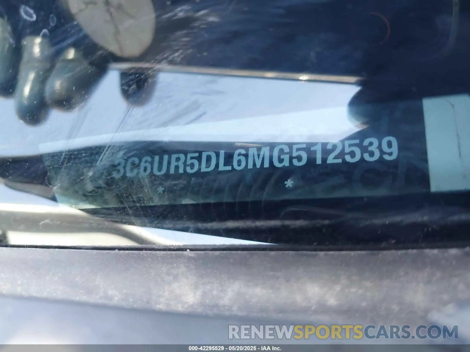 9 Photograph of a damaged car 3C6UR5DL6MG512539 RAM 2500 2021