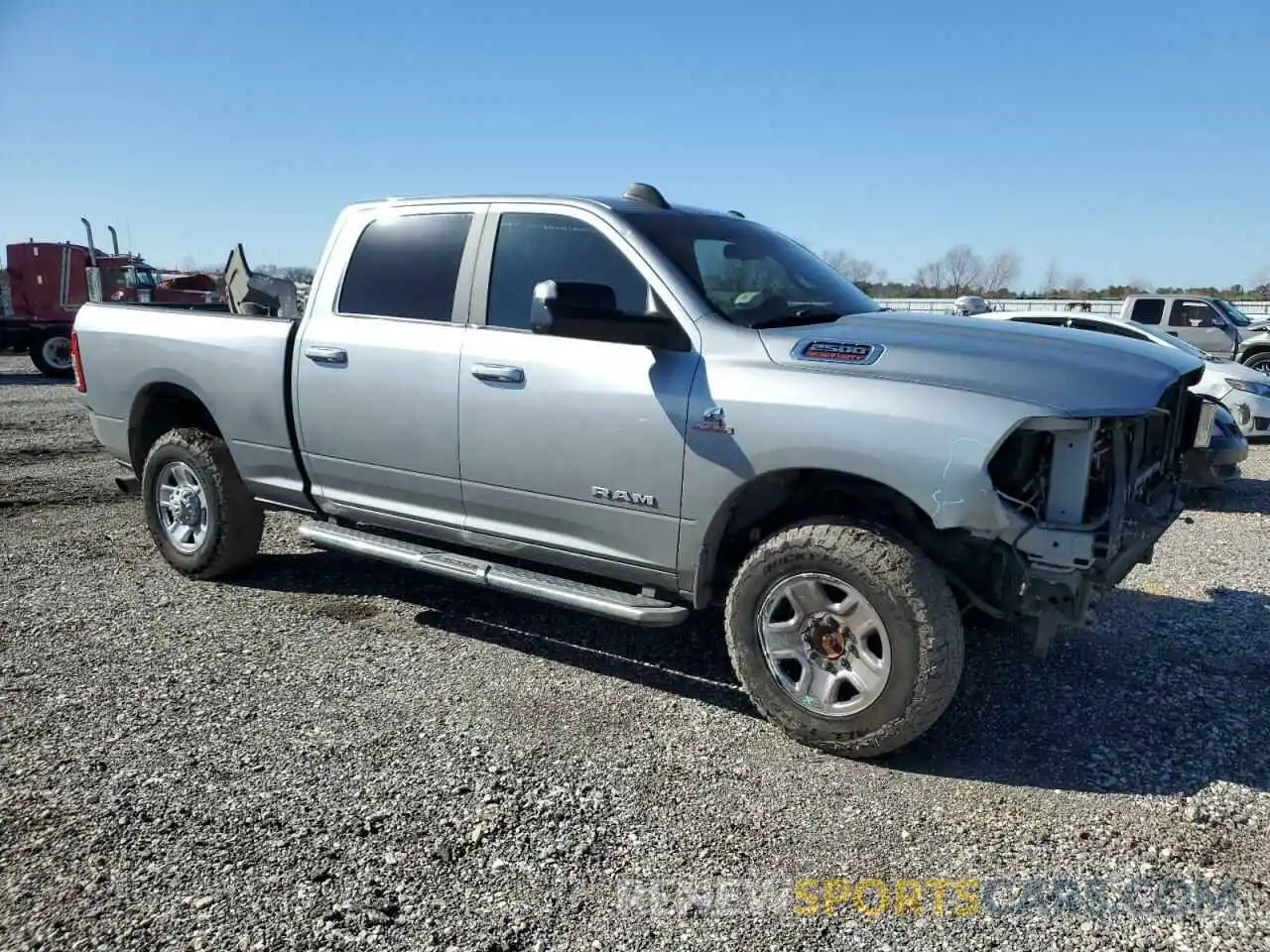 4 Photograph of a damaged car 3C6UR5DL6MG522794 RAM 2500 2021