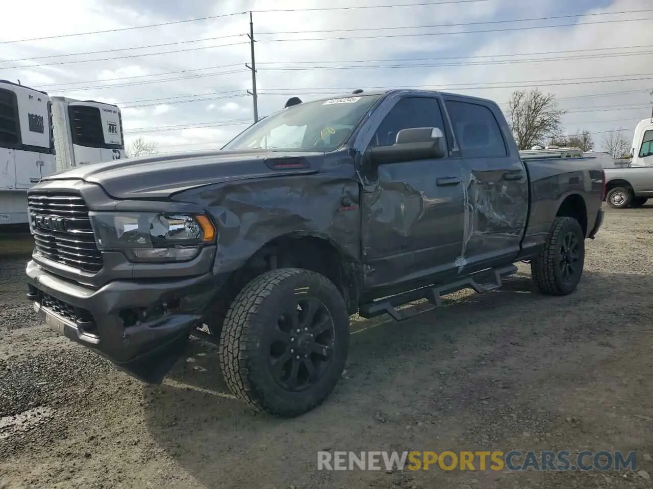 1 Photograph of a damaged car 3C6UR5DL7MG561281 RAM 2500 2021