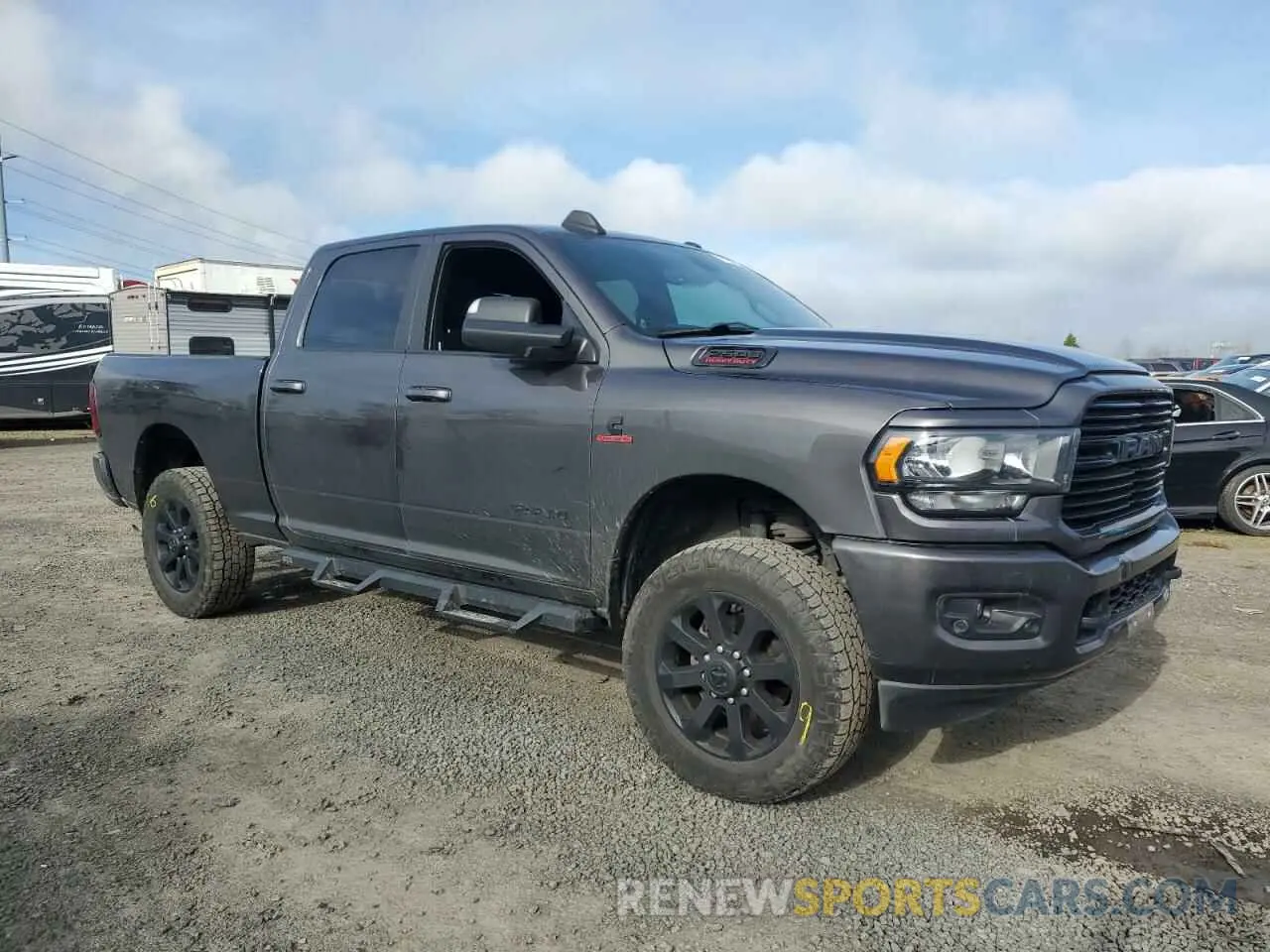 4 Photograph of a damaged car 3C6UR5DL7MG561281 RAM 2500 2021