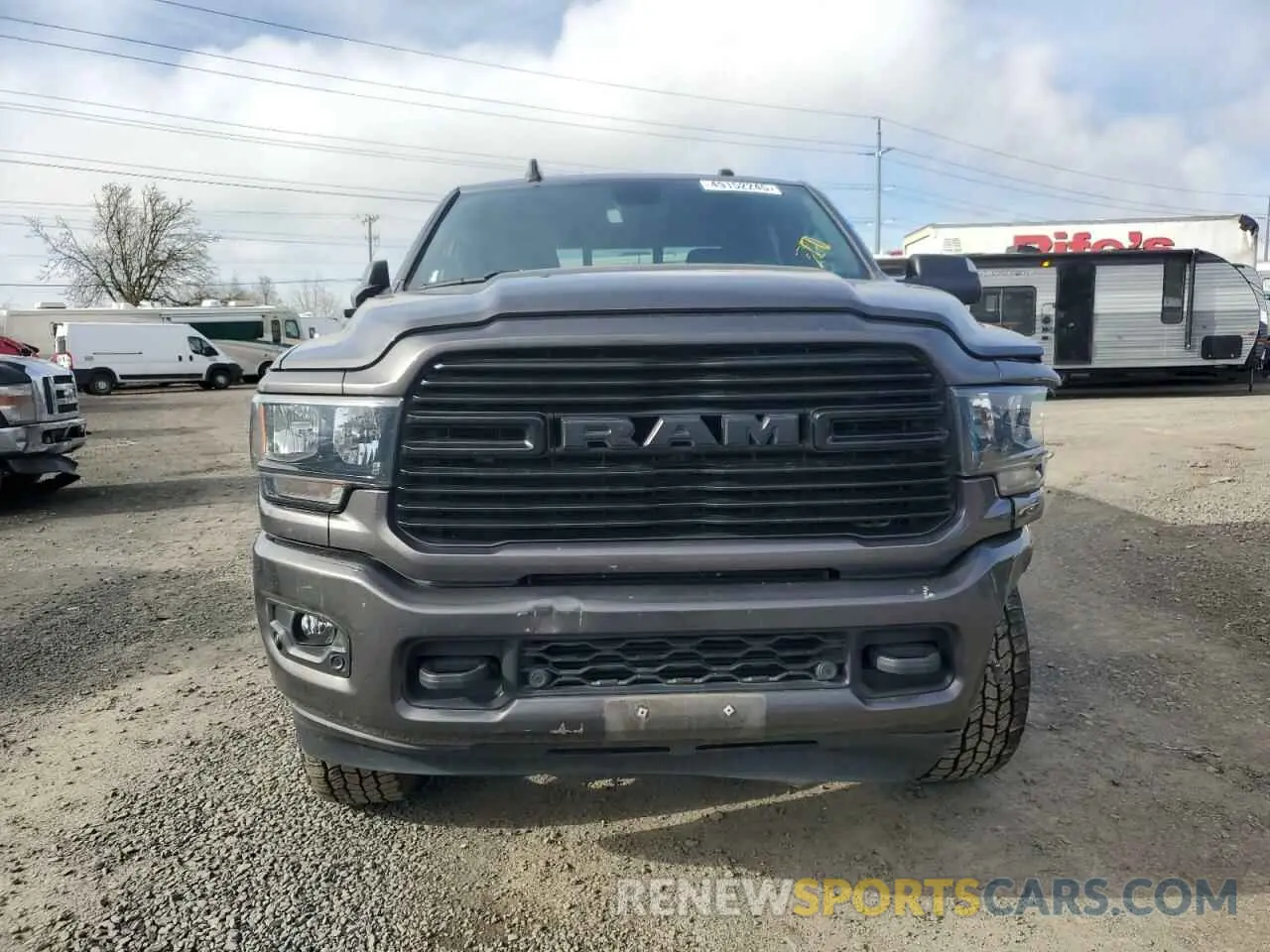 5 Photograph of a damaged car 3C6UR5DL7MG561281 RAM 2500 2021