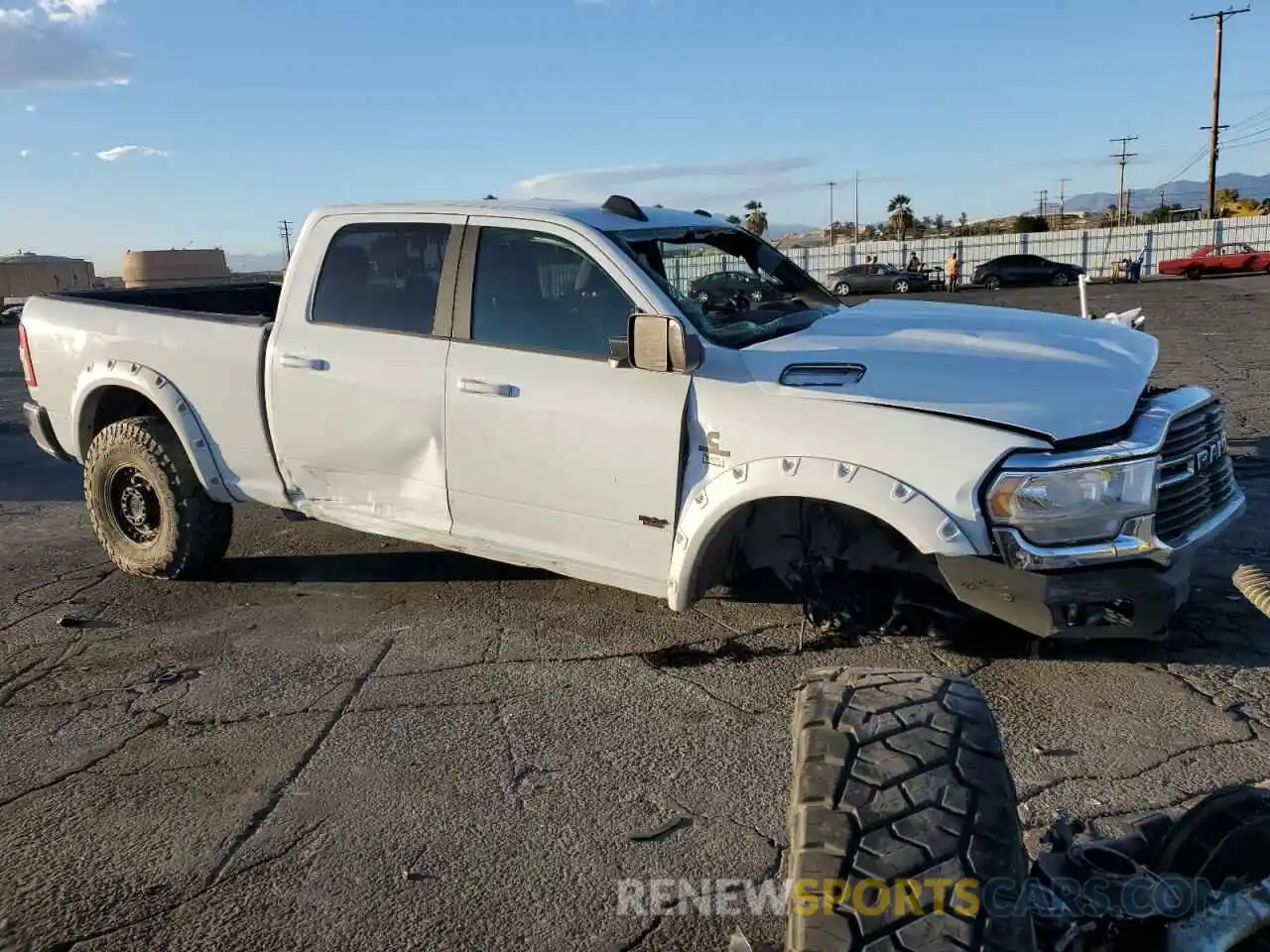 4 Photograph of a damaged car 3C6UR5DL7MG628624 RAM 2500 2021