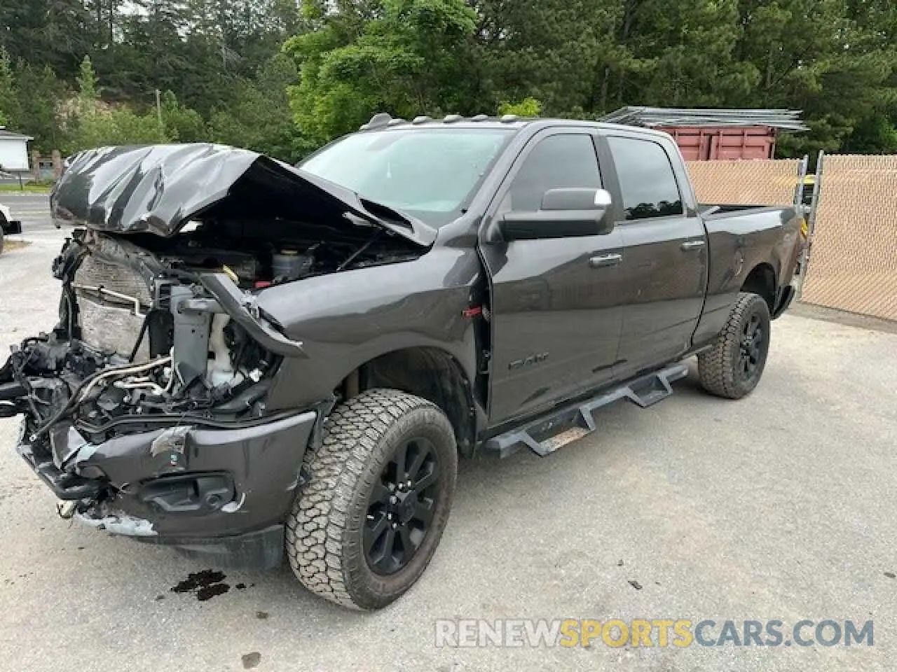 1 Photograph of a damaged car 3C6UR5DL7MG658139 RAM 2500 2021