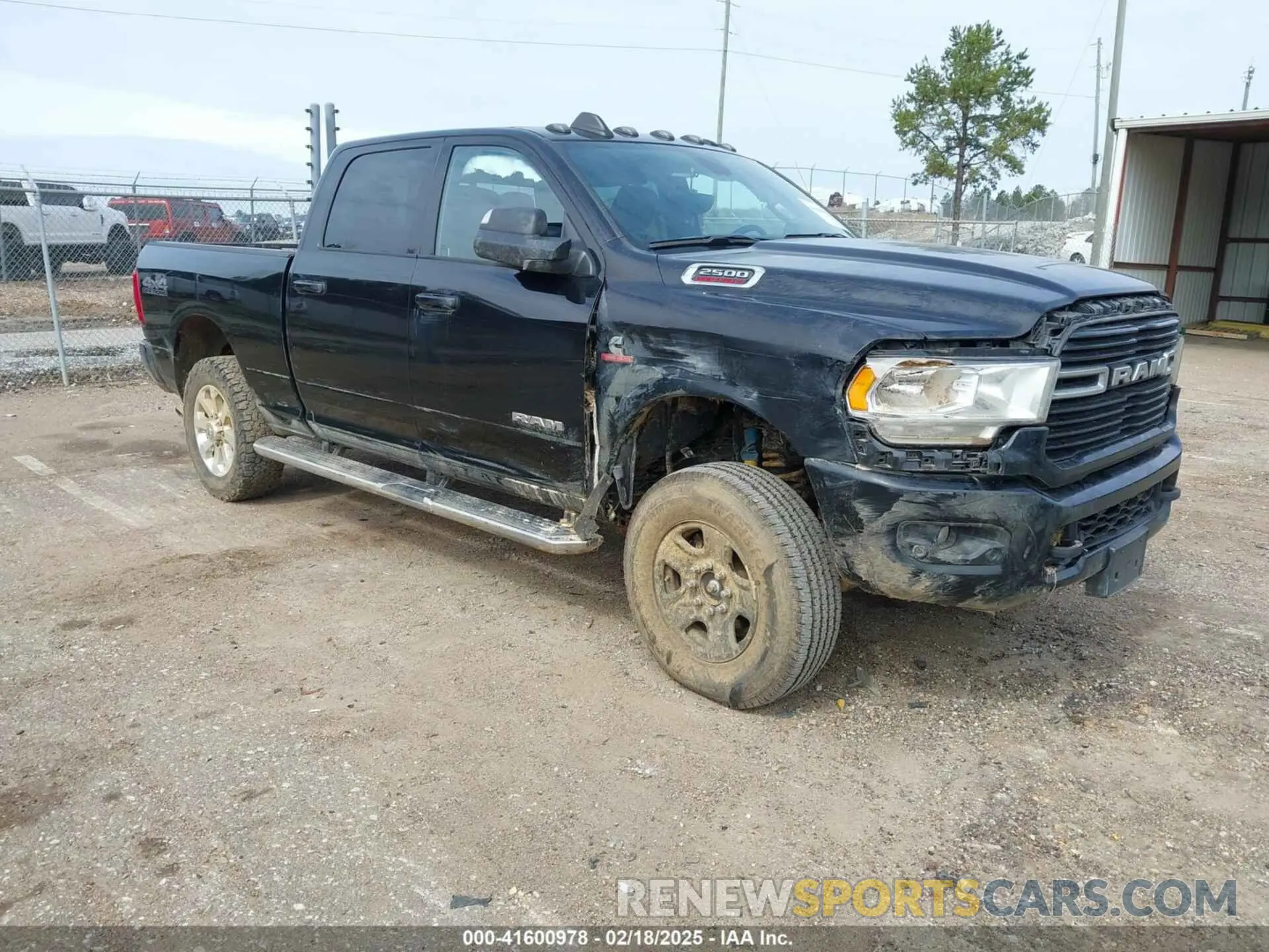 1 Photograph of a damaged car 3C6UR5DL7MG695398 RAM 2500 2021