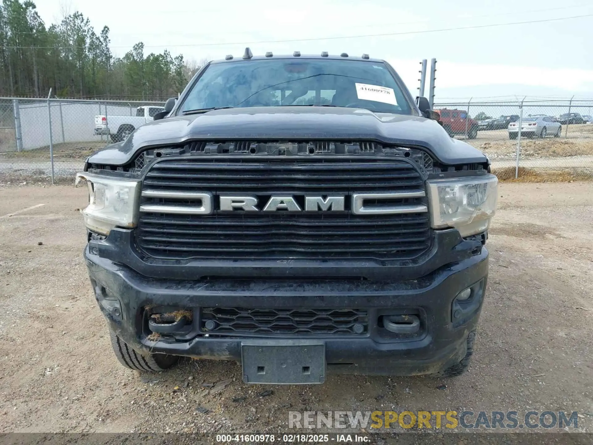 12 Photograph of a damaged car 3C6UR5DL7MG695398 RAM 2500 2021