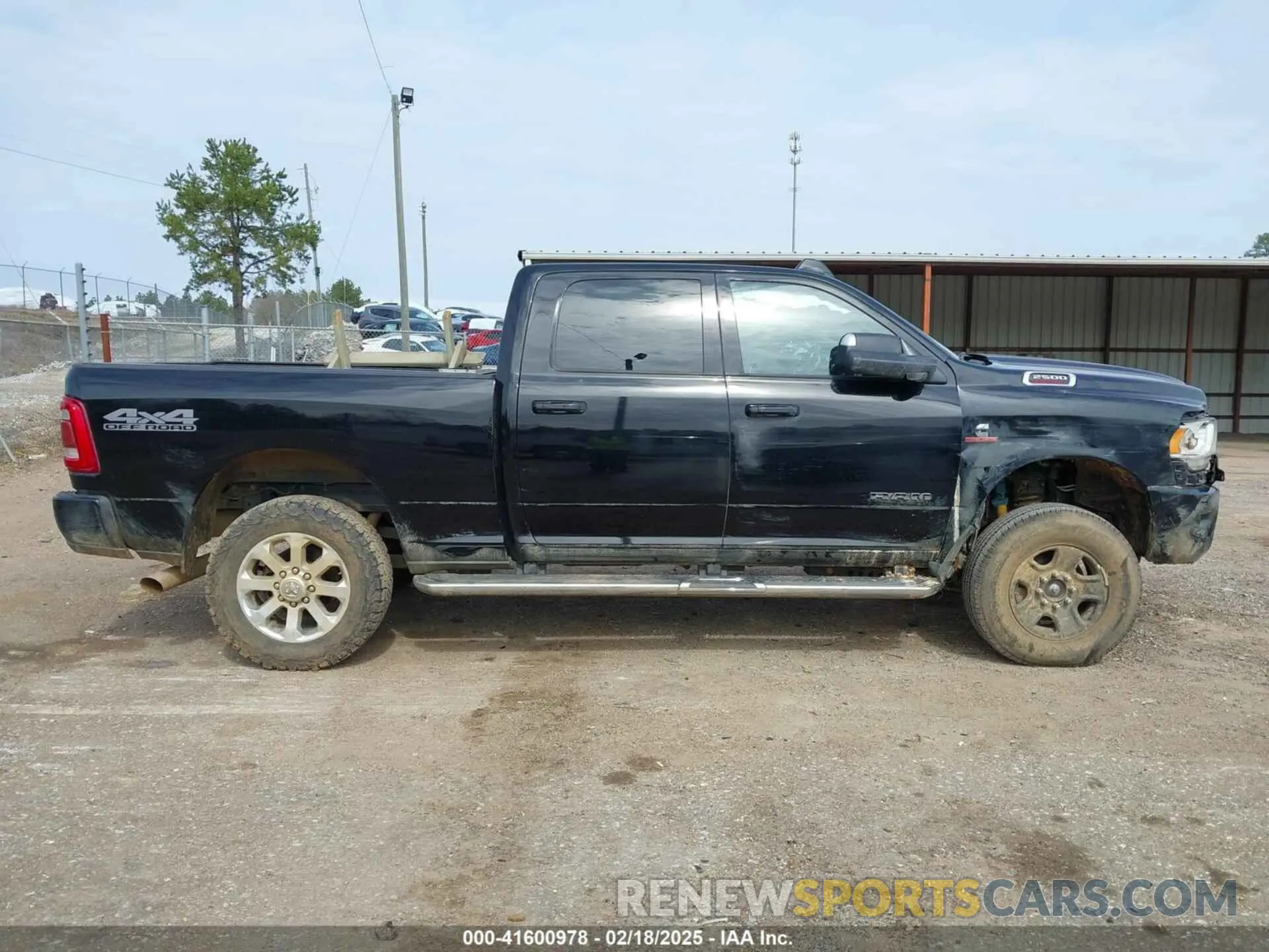 13 Photograph of a damaged car 3C6UR5DL7MG695398 RAM 2500 2021