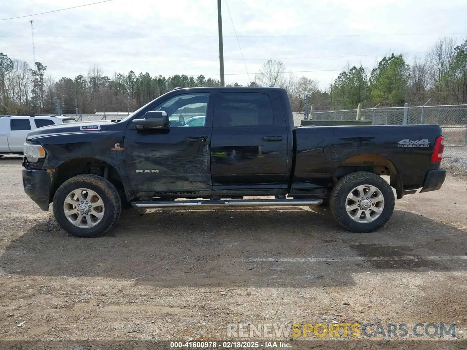 14 Photograph of a damaged car 3C6UR5DL7MG695398 RAM 2500 2021