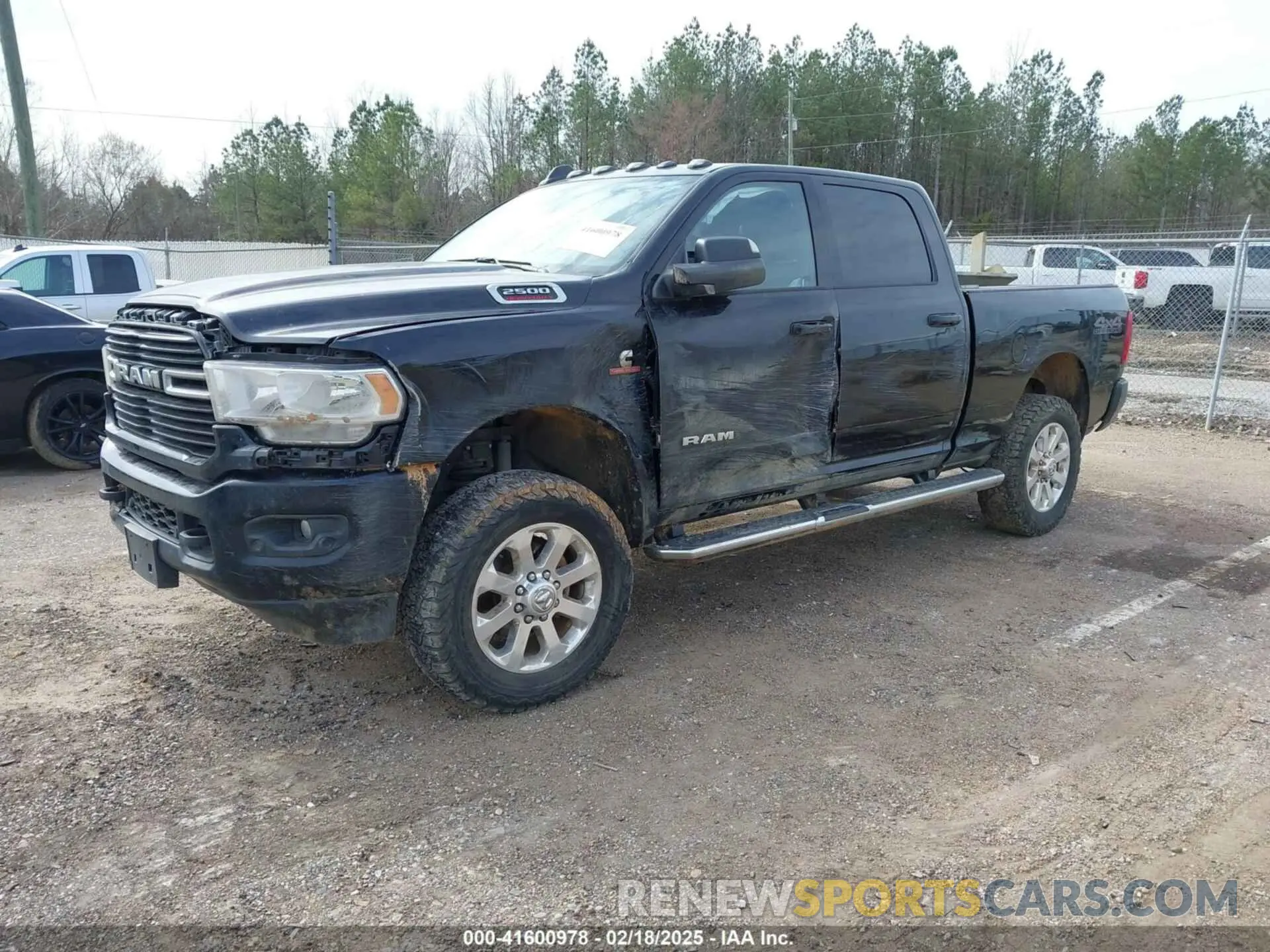 2 Photograph of a damaged car 3C6UR5DL7MG695398 RAM 2500 2021