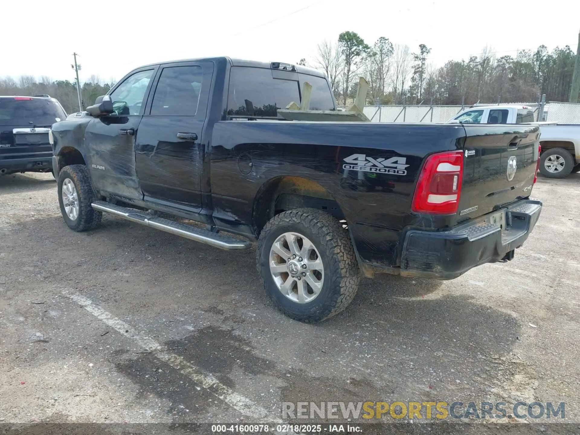 3 Photograph of a damaged car 3C6UR5DL7MG695398 RAM 2500 2021