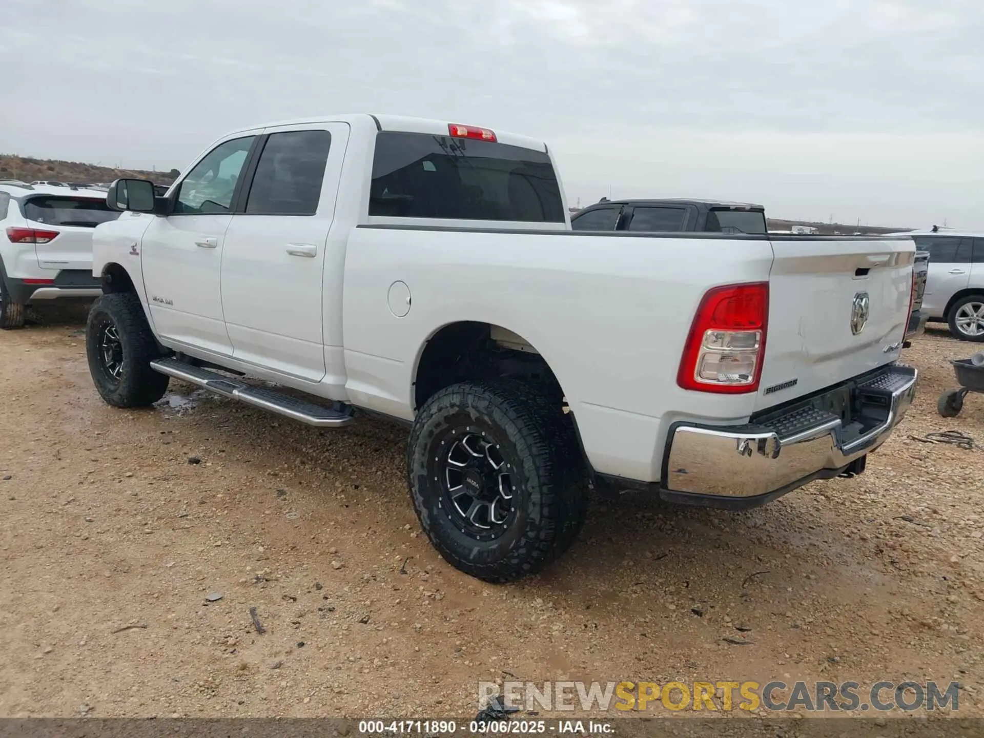 3 Photograph of a damaged car 3C6UR5DL8MG605823 RAM 2500 2021