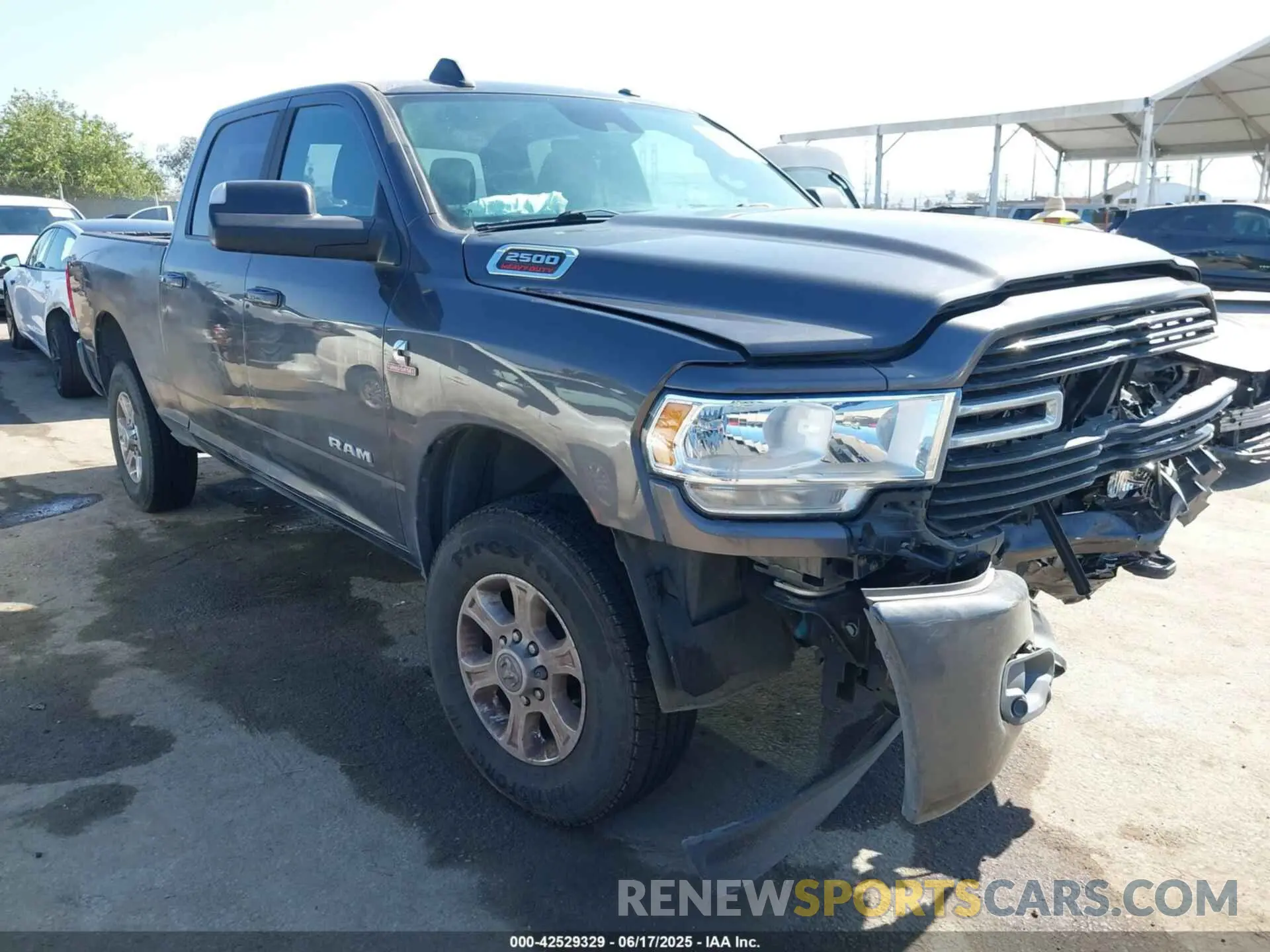 1 Photograph of a damaged car 3C6UR5DLXMG584554 RAM 2500 2021