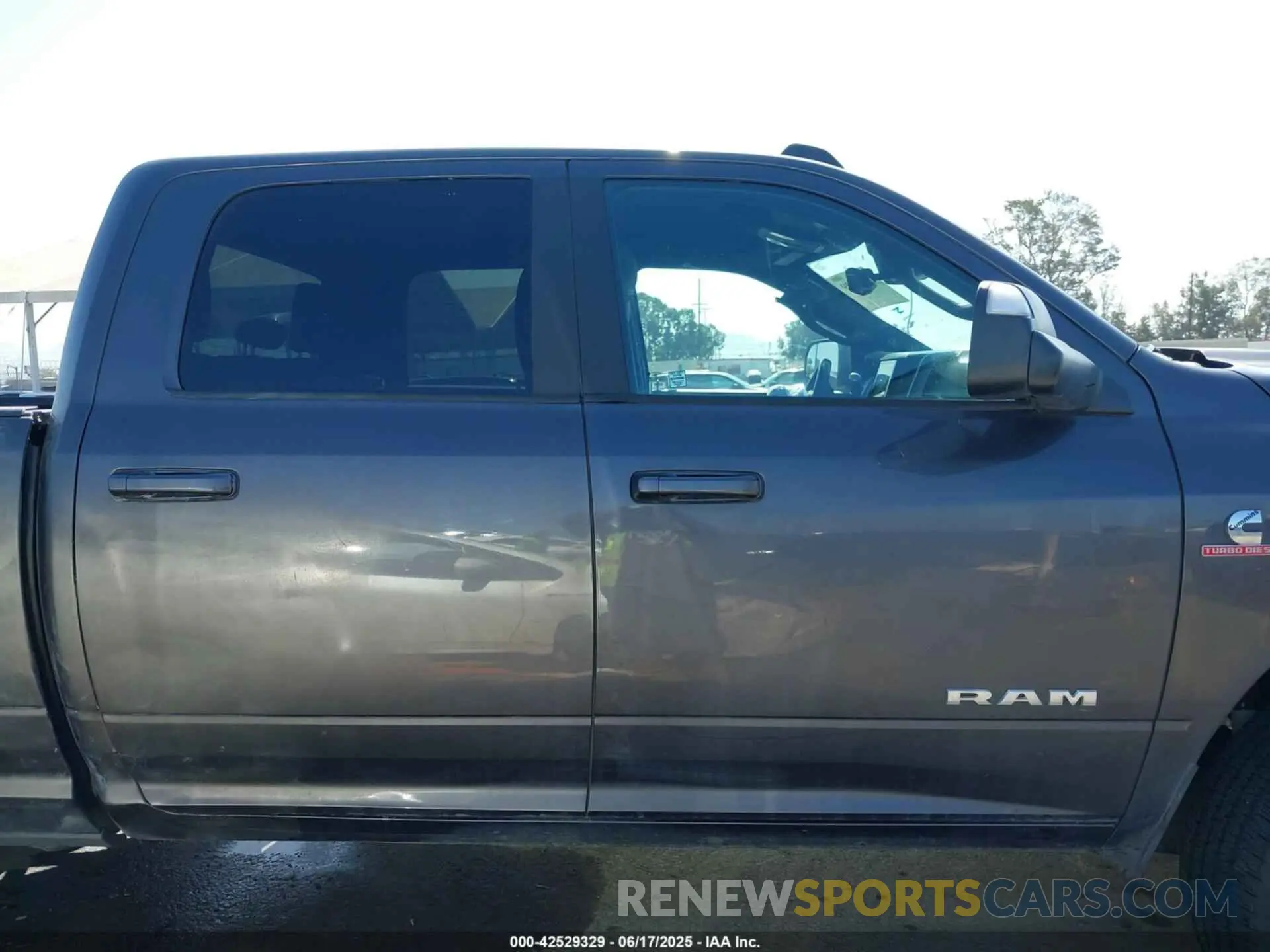 12 Photograph of a damaged car 3C6UR5DLXMG584554 RAM 2500 2021