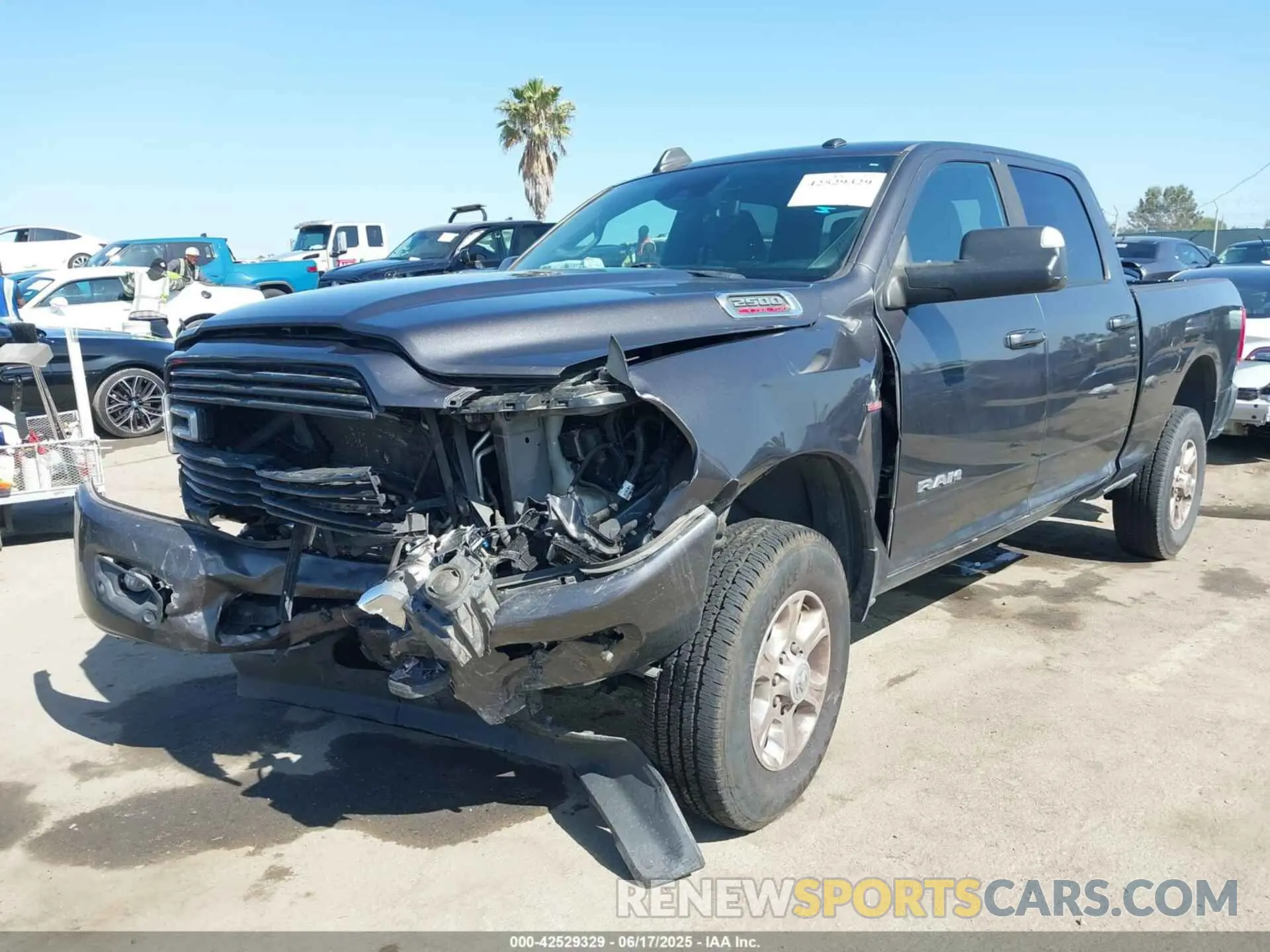 2 Photograph of a damaged car 3C6UR5DLXMG584554 RAM 2500 2021