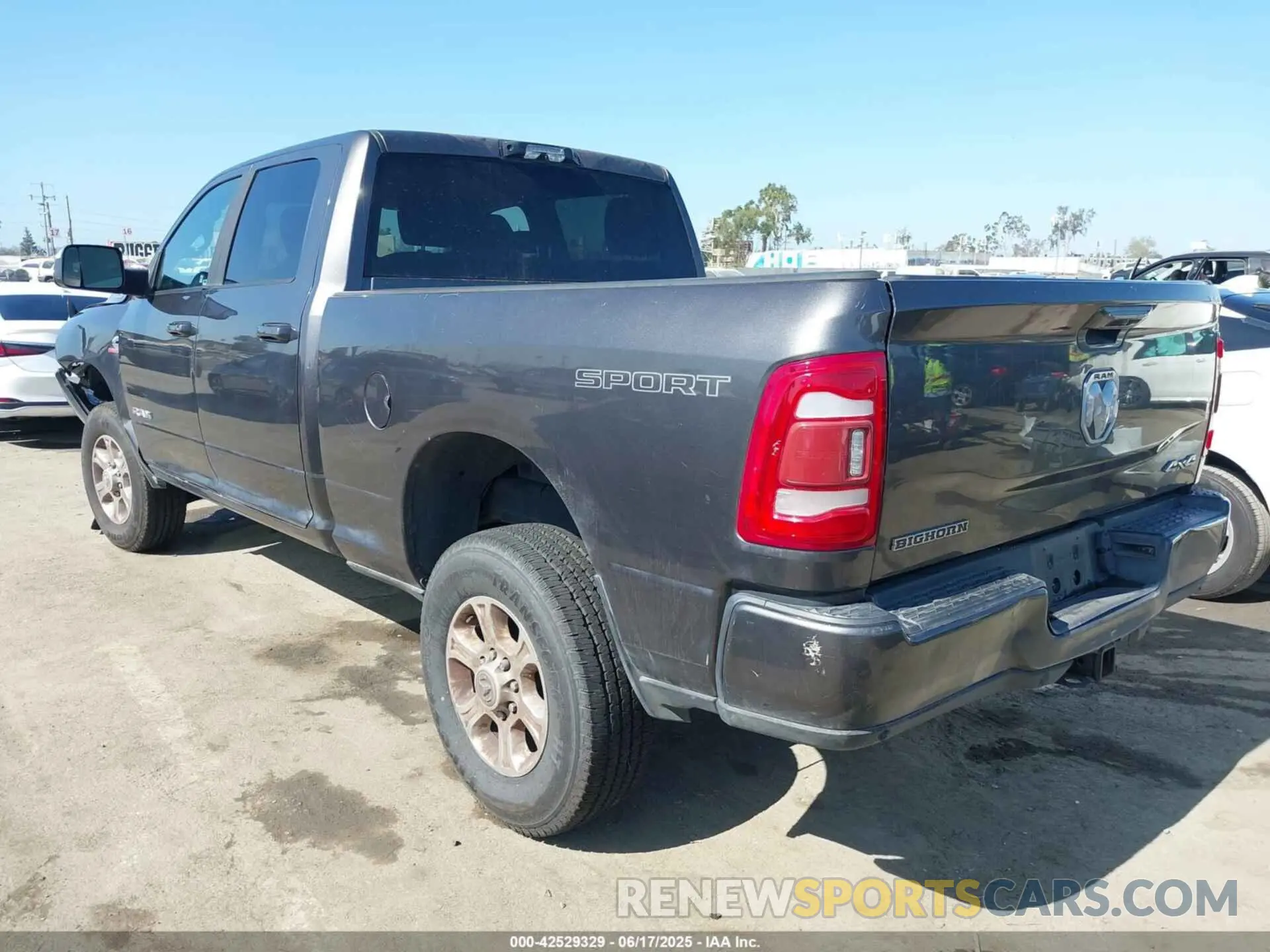 3 Photograph of a damaged car 3C6UR5DLXMG584554 RAM 2500 2021