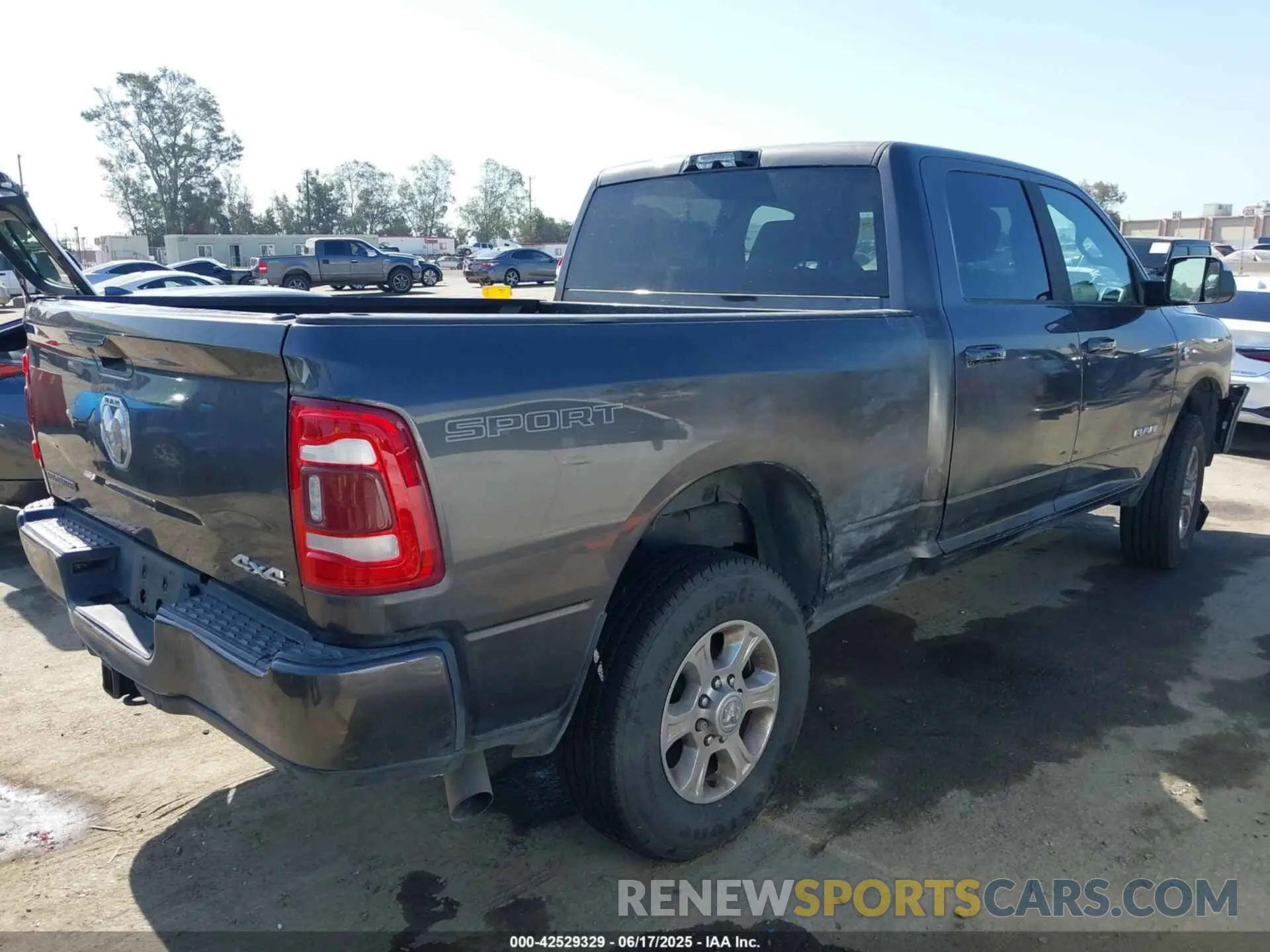4 Photograph of a damaged car 3C6UR5DLXMG584554 RAM 2500 2021