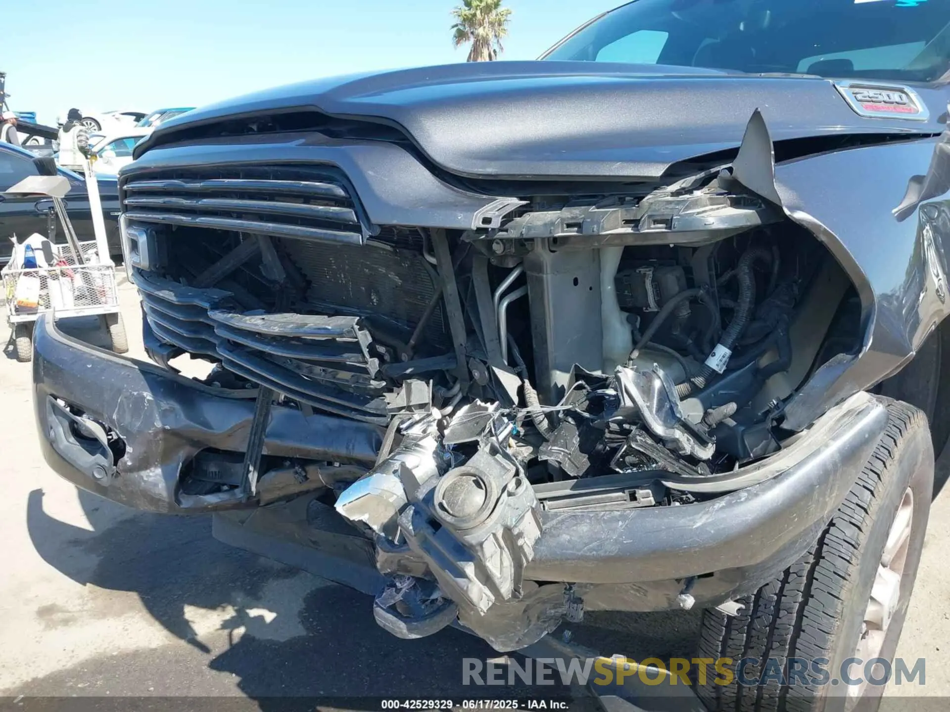 6 Photograph of a damaged car 3C6UR5DLXMG584554 RAM 2500 2021