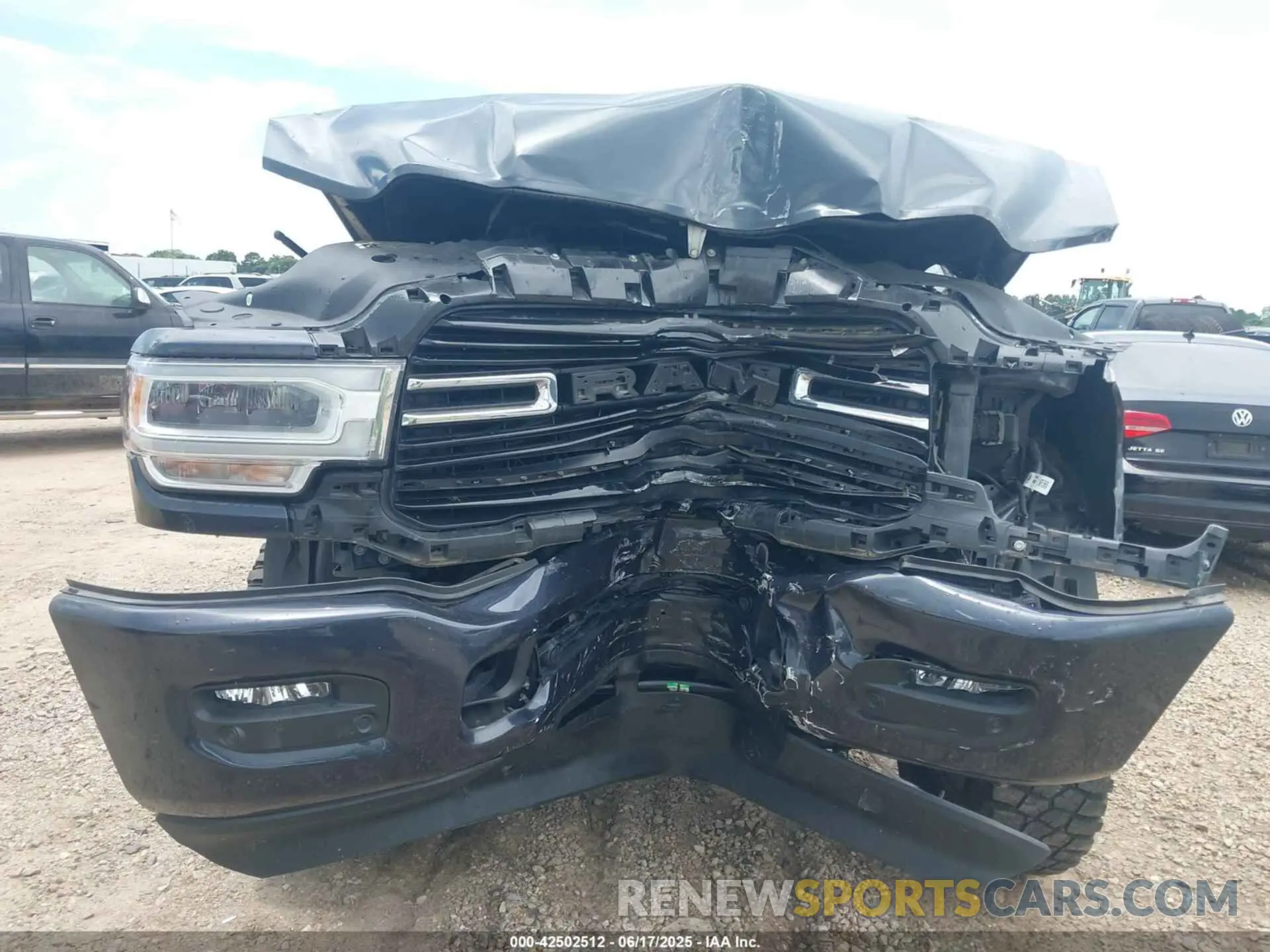 12 Photograph of a damaged car 3C6UR5DLXMG659821 RAM 2500 2021