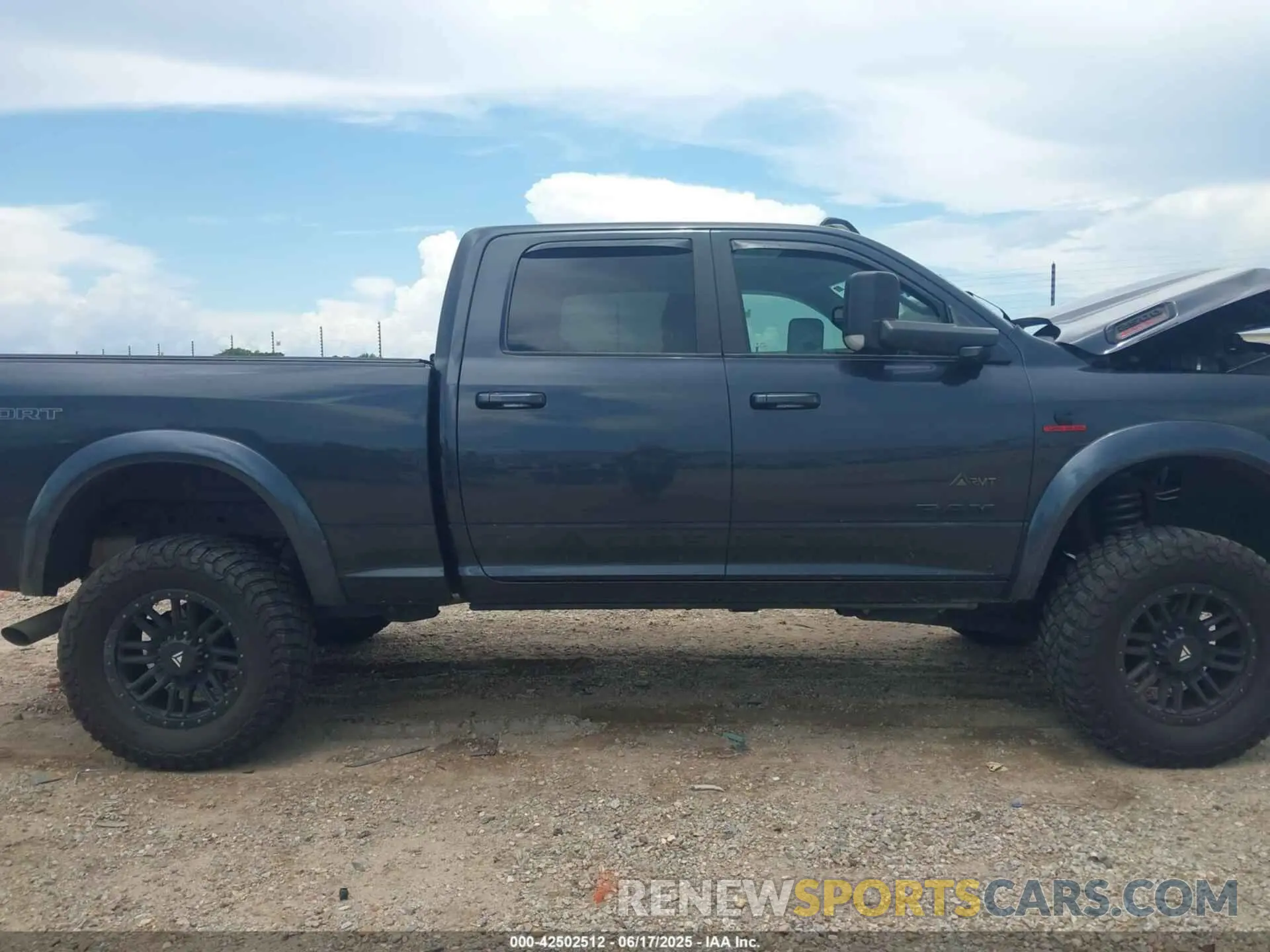 13 Photograph of a damaged car 3C6UR5DLXMG659821 RAM 2500 2021