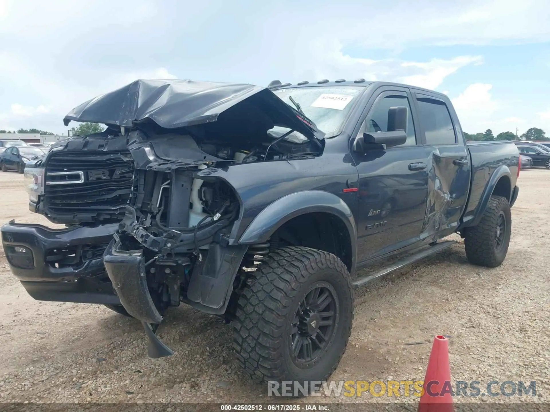 2 Photograph of a damaged car 3C6UR5DLXMG659821 RAM 2500 2021