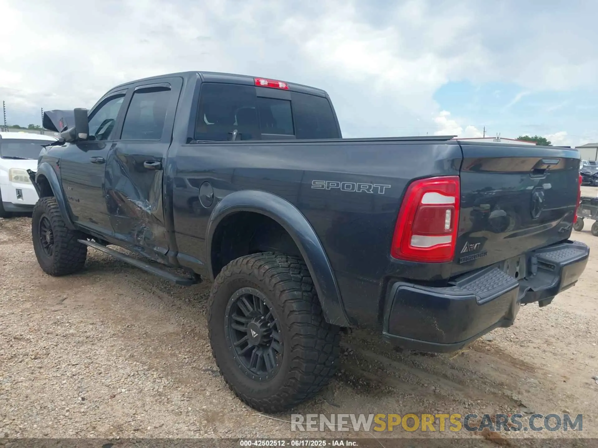 3 Photograph of a damaged car 3C6UR5DLXMG659821 RAM 2500 2021