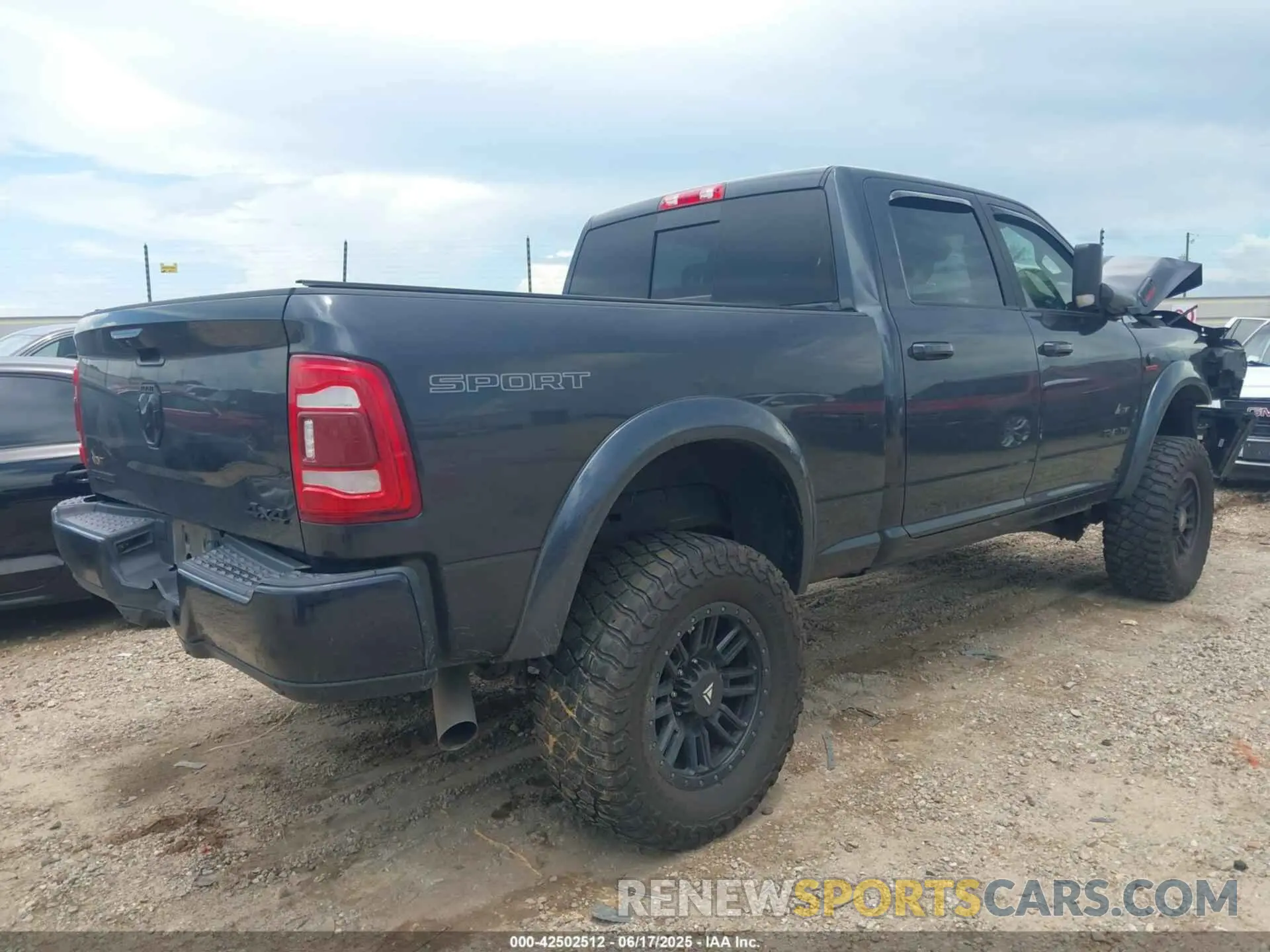 4 Photograph of a damaged car 3C6UR5DLXMG659821 RAM 2500 2021