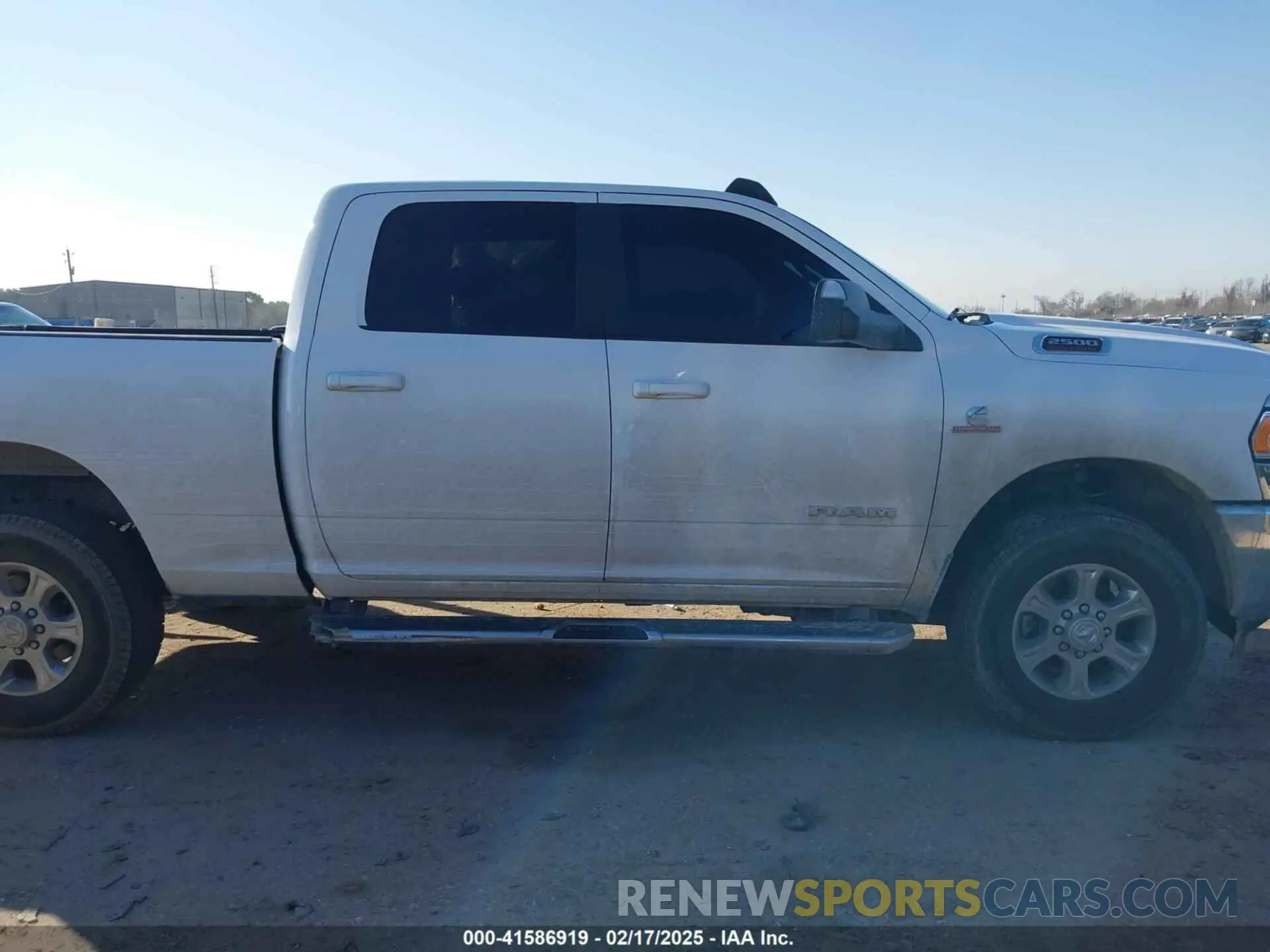 13 Photograph of a damaged car 3C6UR5DLXMG676909 RAM 2500 2021