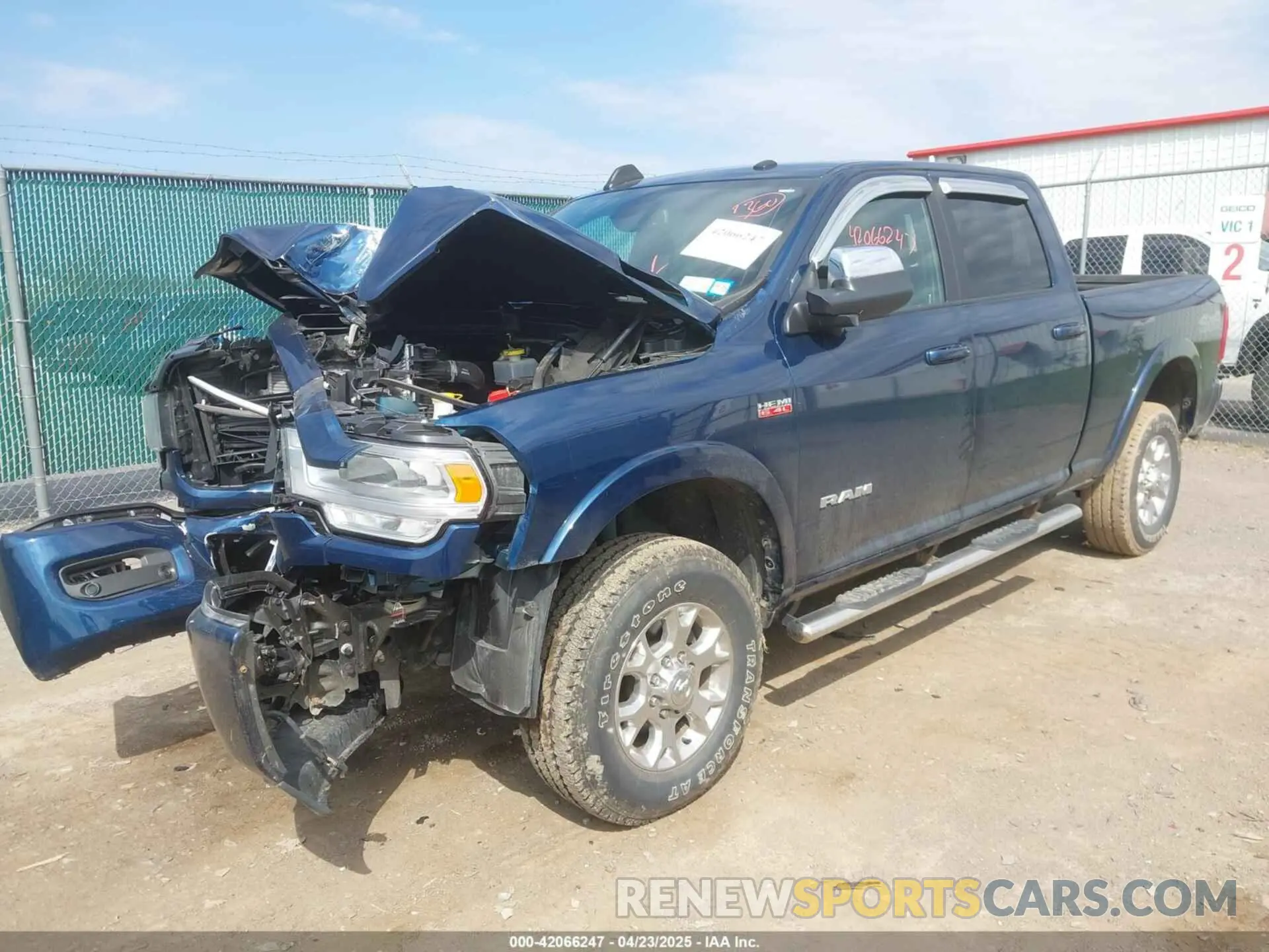 2 Photograph of a damaged car 3C6UR5FJ2MG668959 RAM 2500 2021
