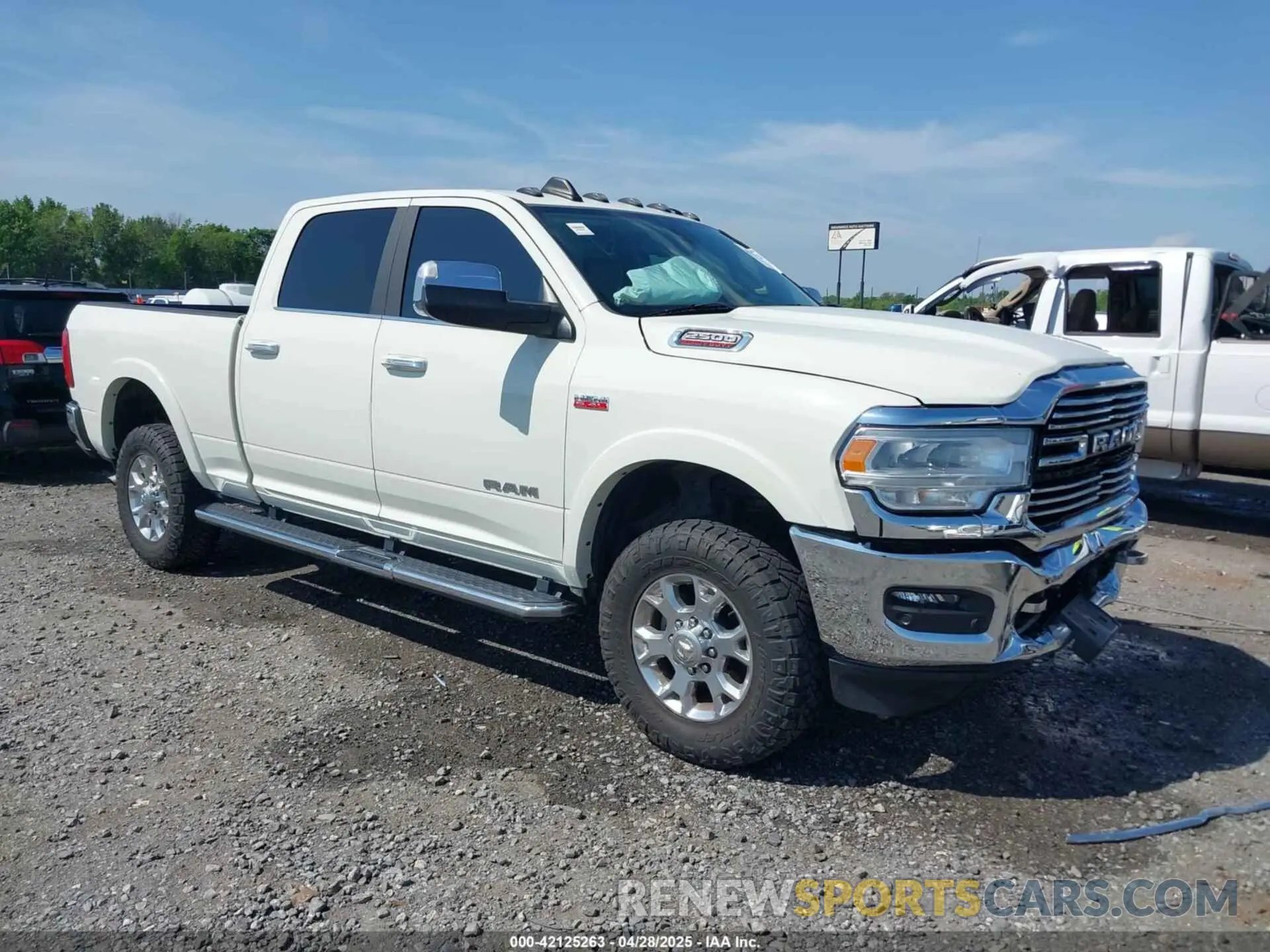 1 Photograph of a damaged car 3C6UR5FJ7MG659156 RAM 2500 2021