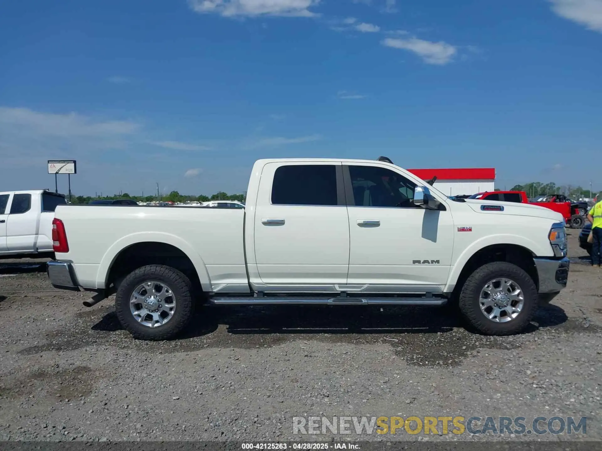 13 Photograph of a damaged car 3C6UR5FJ7MG659156 RAM 2500 2021