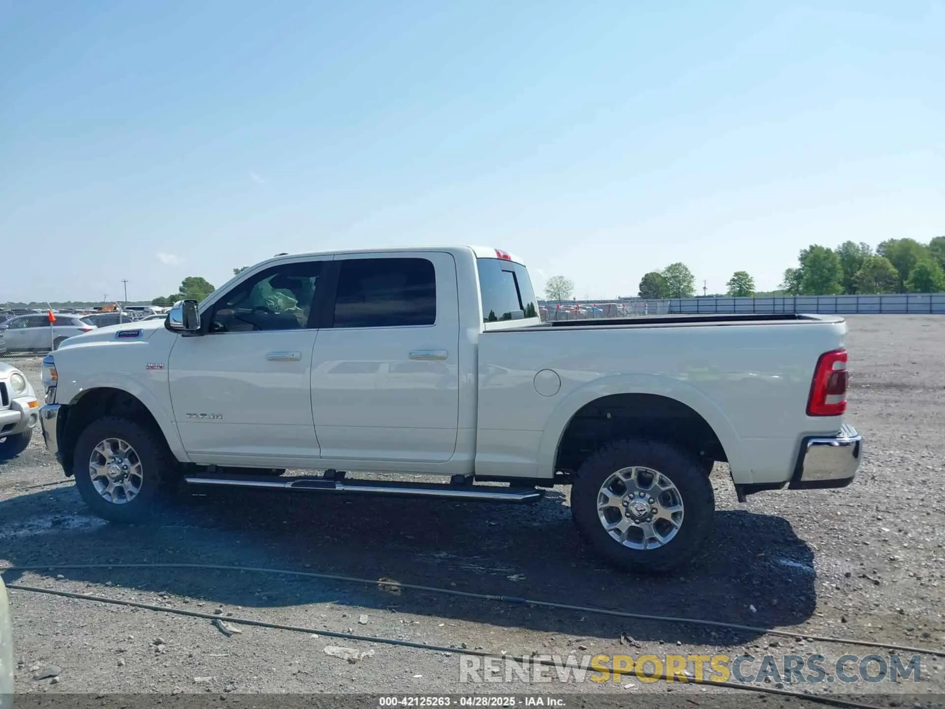 14 Photograph of a damaged car 3C6UR5FJ7MG659156 RAM 2500 2021
