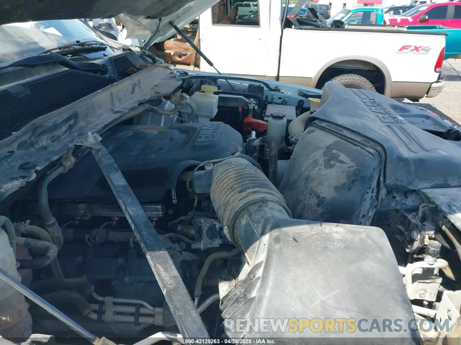 19 Photograph of a damaged car 3C6UR5FJ7MG659156 RAM 2500 2021