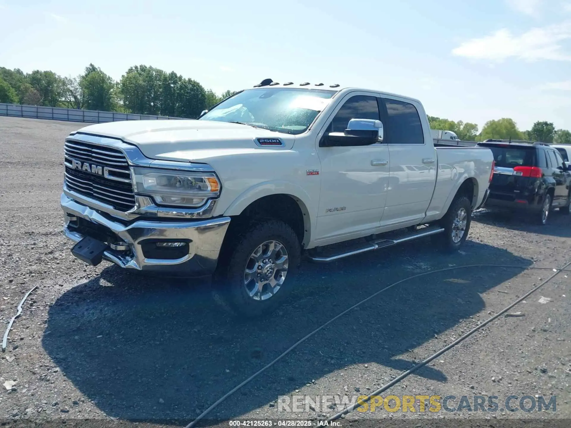 2 Photograph of a damaged car 3C6UR5FJ7MG659156 RAM 2500 2021