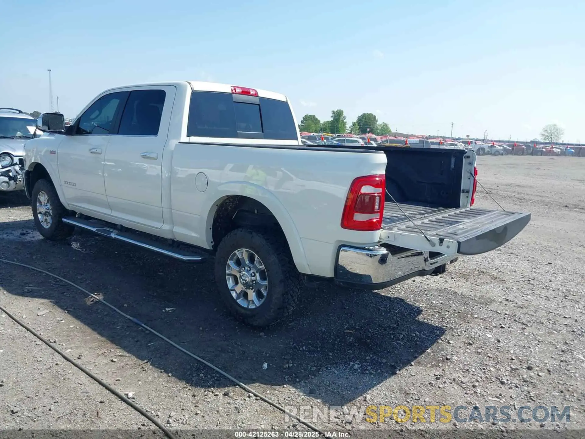 3 Photograph of a damaged car 3C6UR5FJ7MG659156 RAM 2500 2021