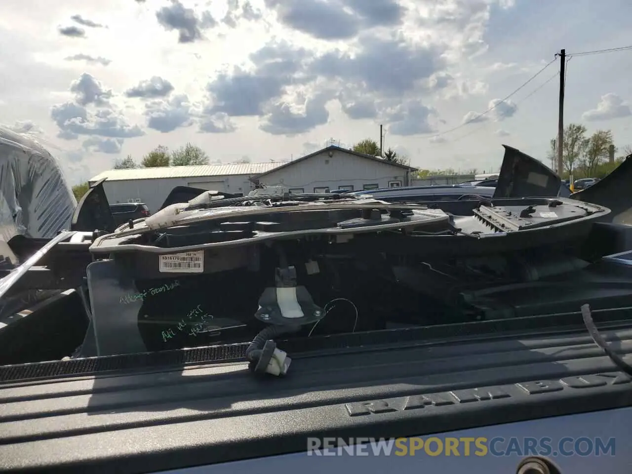 12 Photograph of a damaged car 3C6UR5FJ8MG671770 RAM 2500 2021