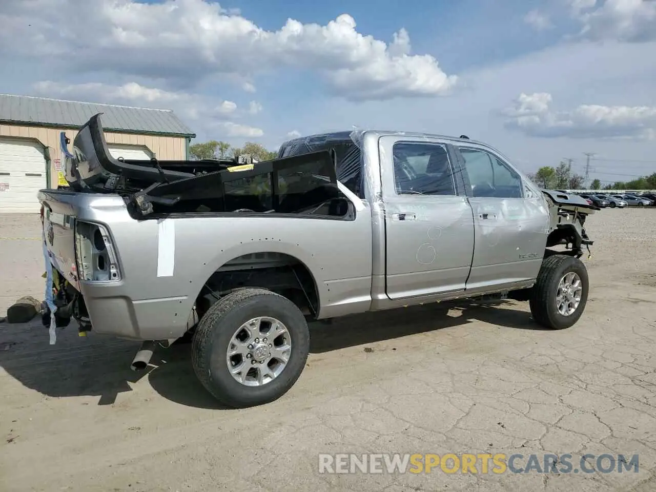 3 Photograph of a damaged car 3C6UR5FJ8MG671770 RAM 2500 2021