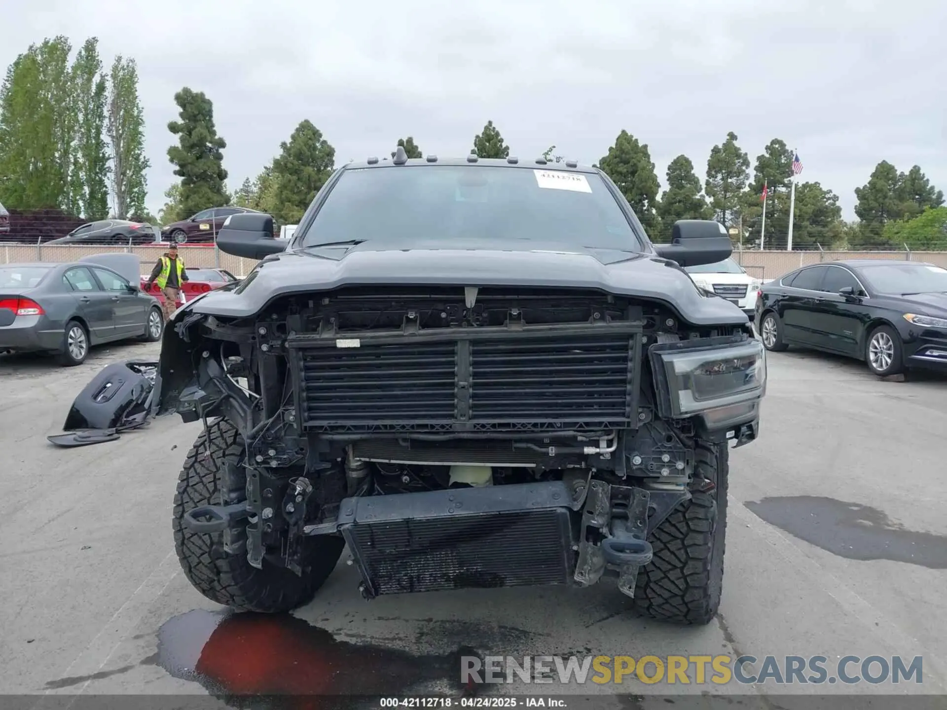 12 Photograph of a damaged car 3C6UR5FL0MG502845 RAM 2500 2021