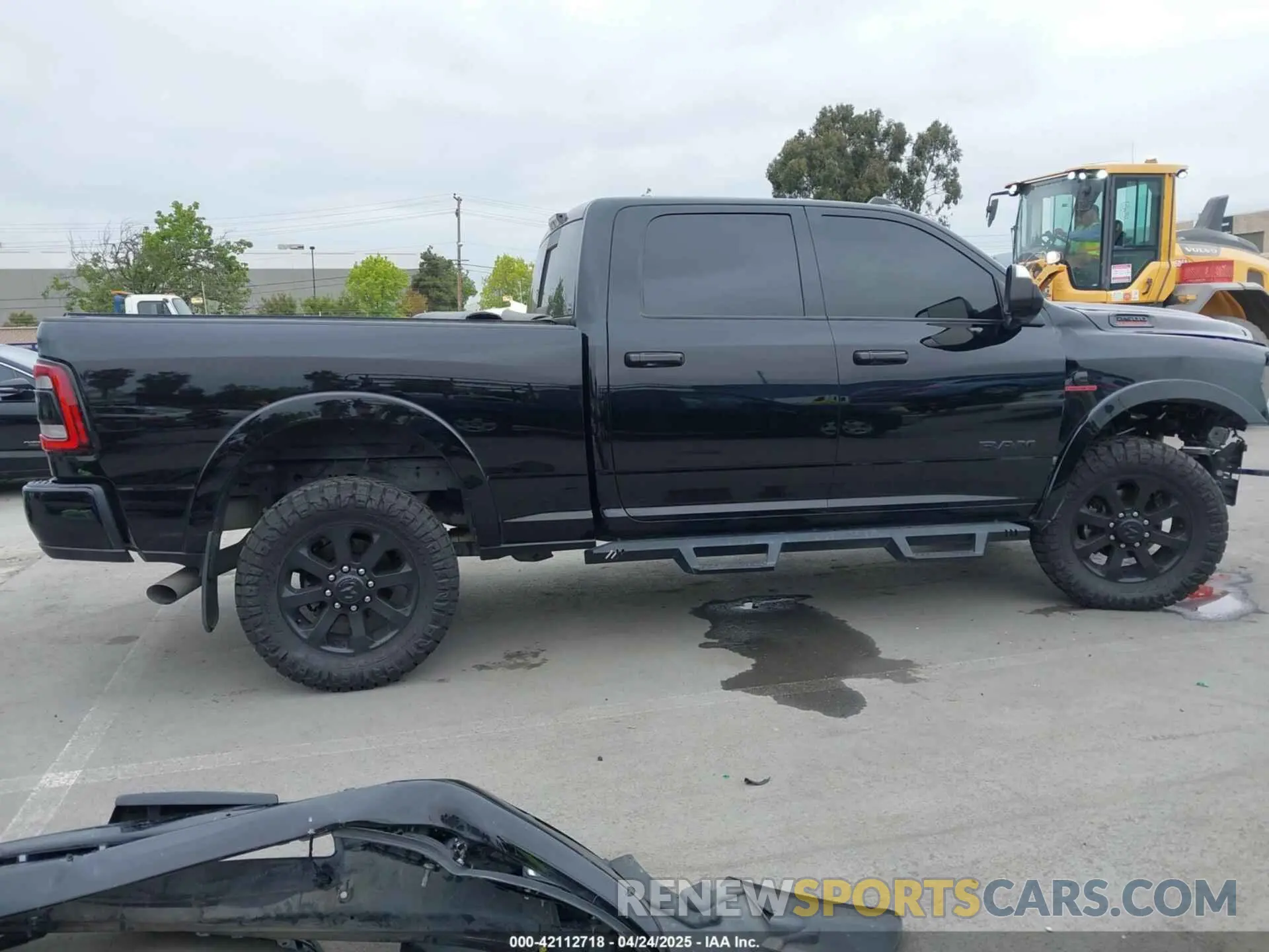 13 Photograph of a damaged car 3C6UR5FL0MG502845 RAM 2500 2021