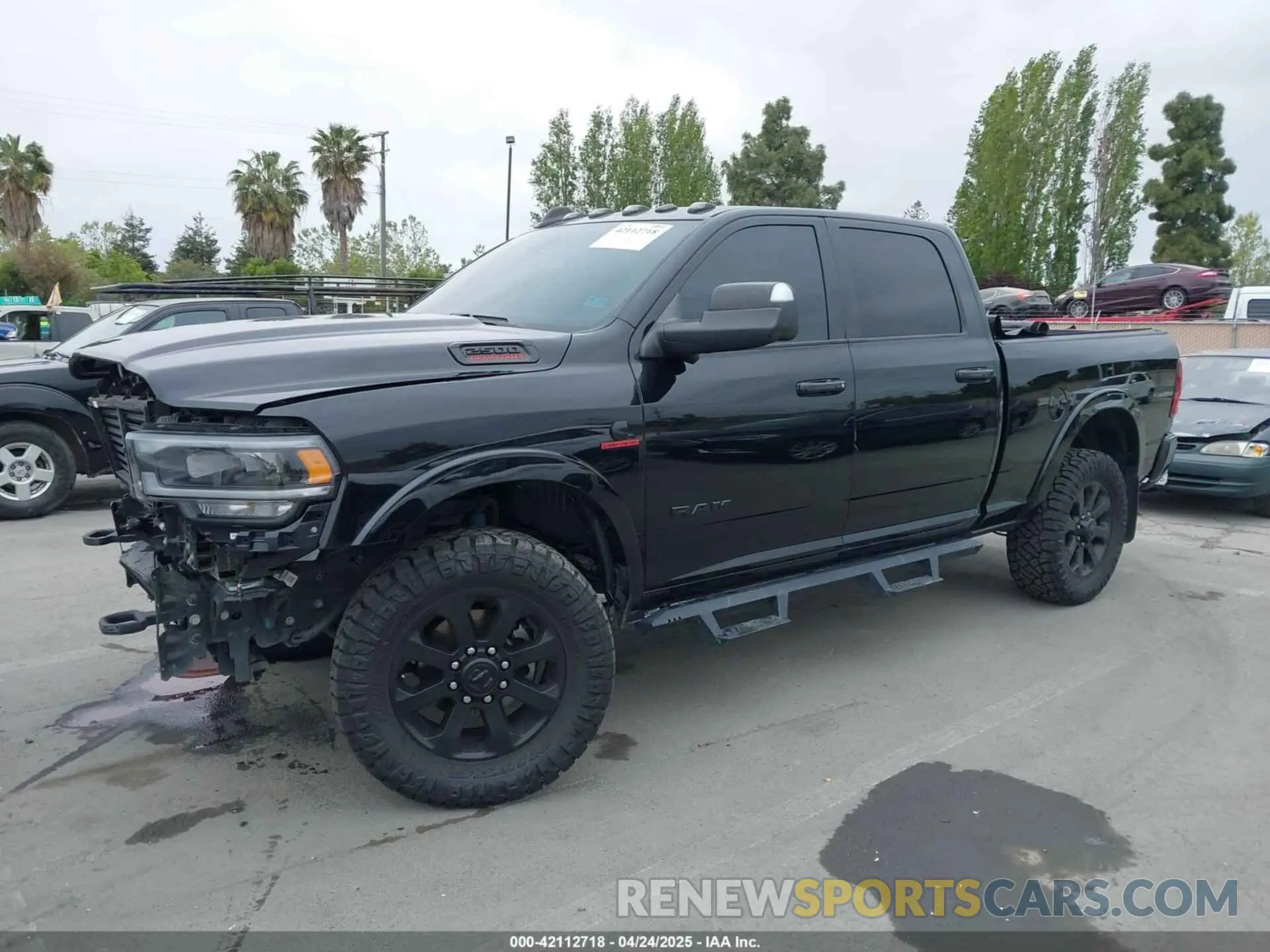 2 Photograph of a damaged car 3C6UR5FL0MG502845 RAM 2500 2021
