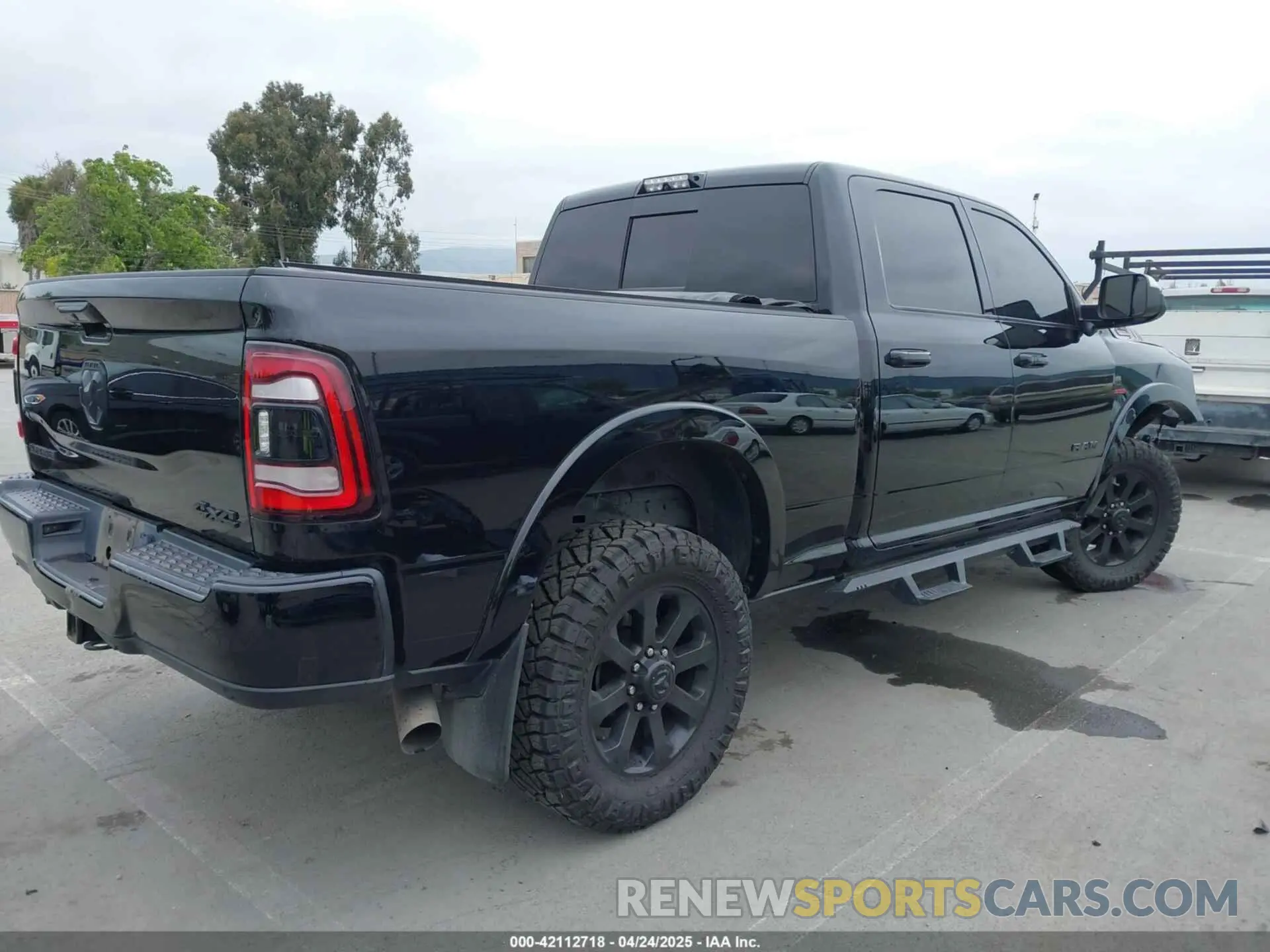 4 Photograph of a damaged car 3C6UR5FL0MG502845 RAM 2500 2021