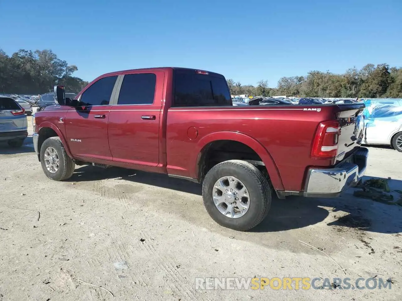 2 Photograph of a damaged car 3C6UR5FL0MG669898 RAM 2500 2021