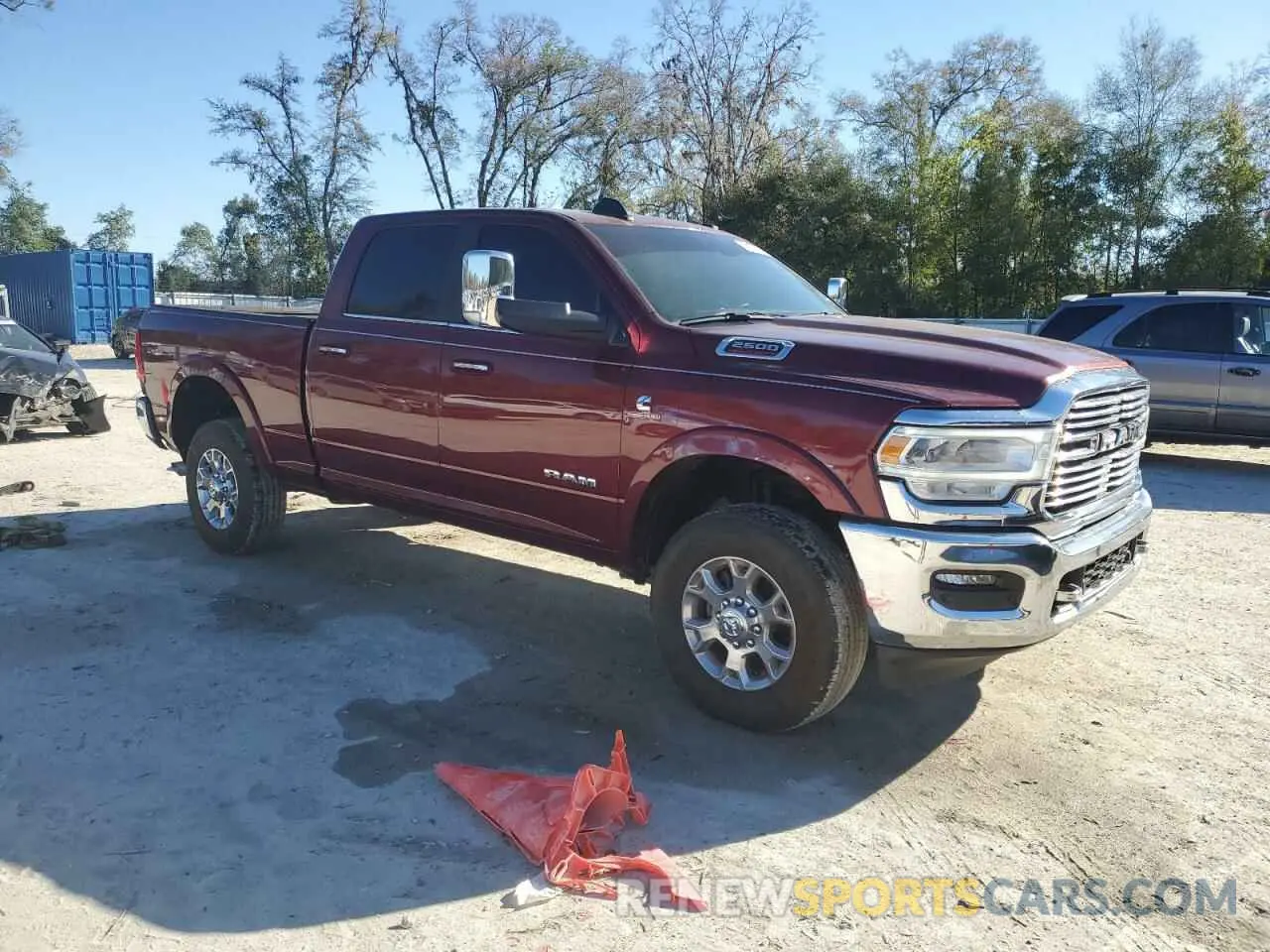 4 Photograph of a damaged car 3C6UR5FL0MG669898 RAM 2500 2021
